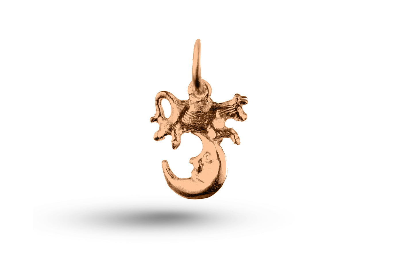 Rose gold Cow over Moon charm.