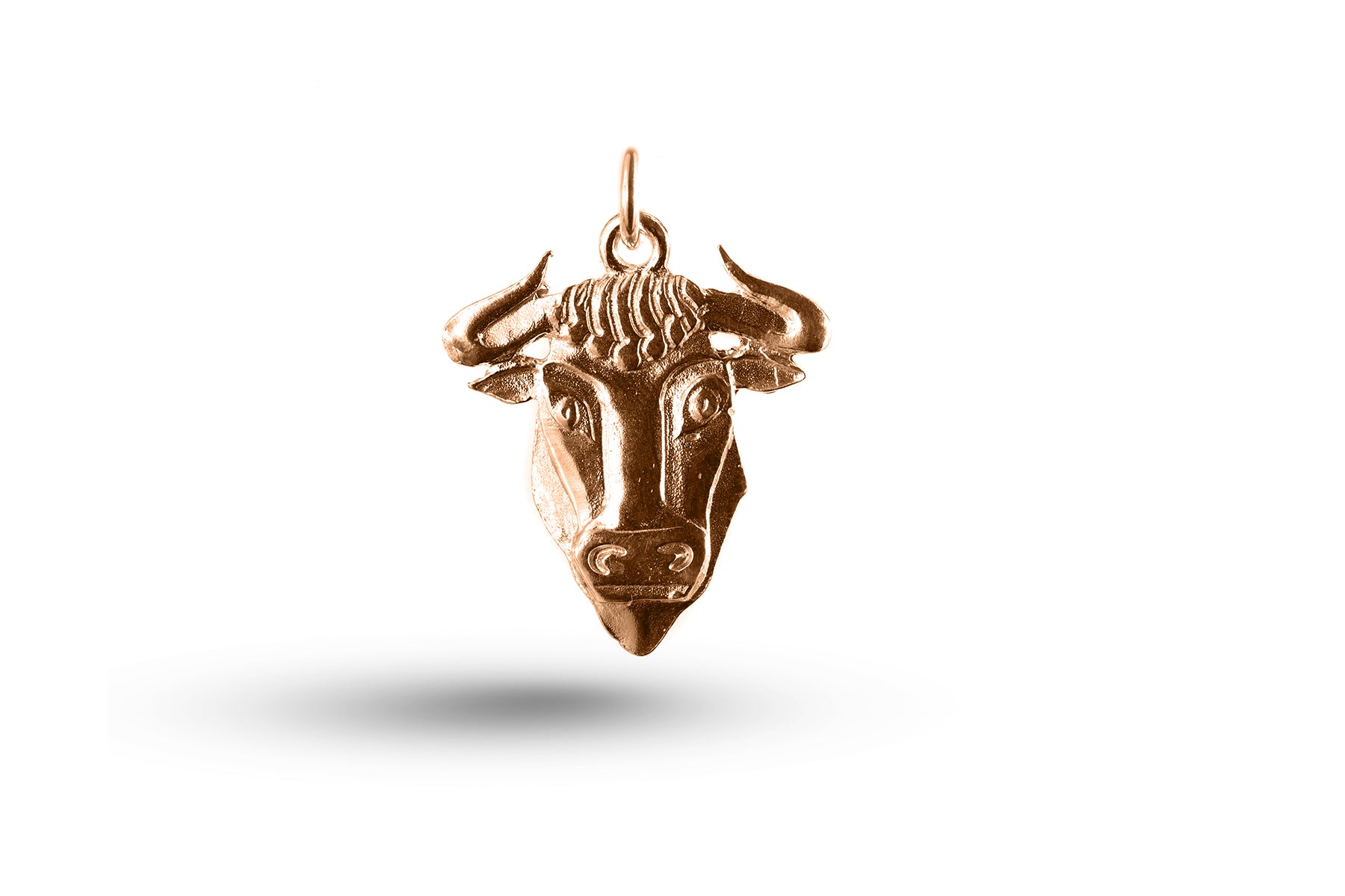 Rose gold Taurus charm.