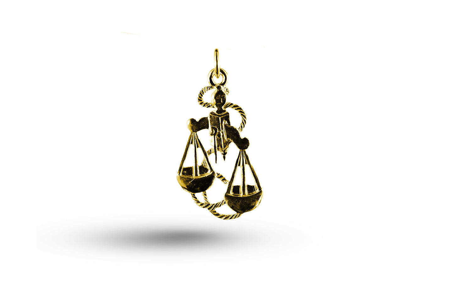 Yellow gold Fancy Libra charm.