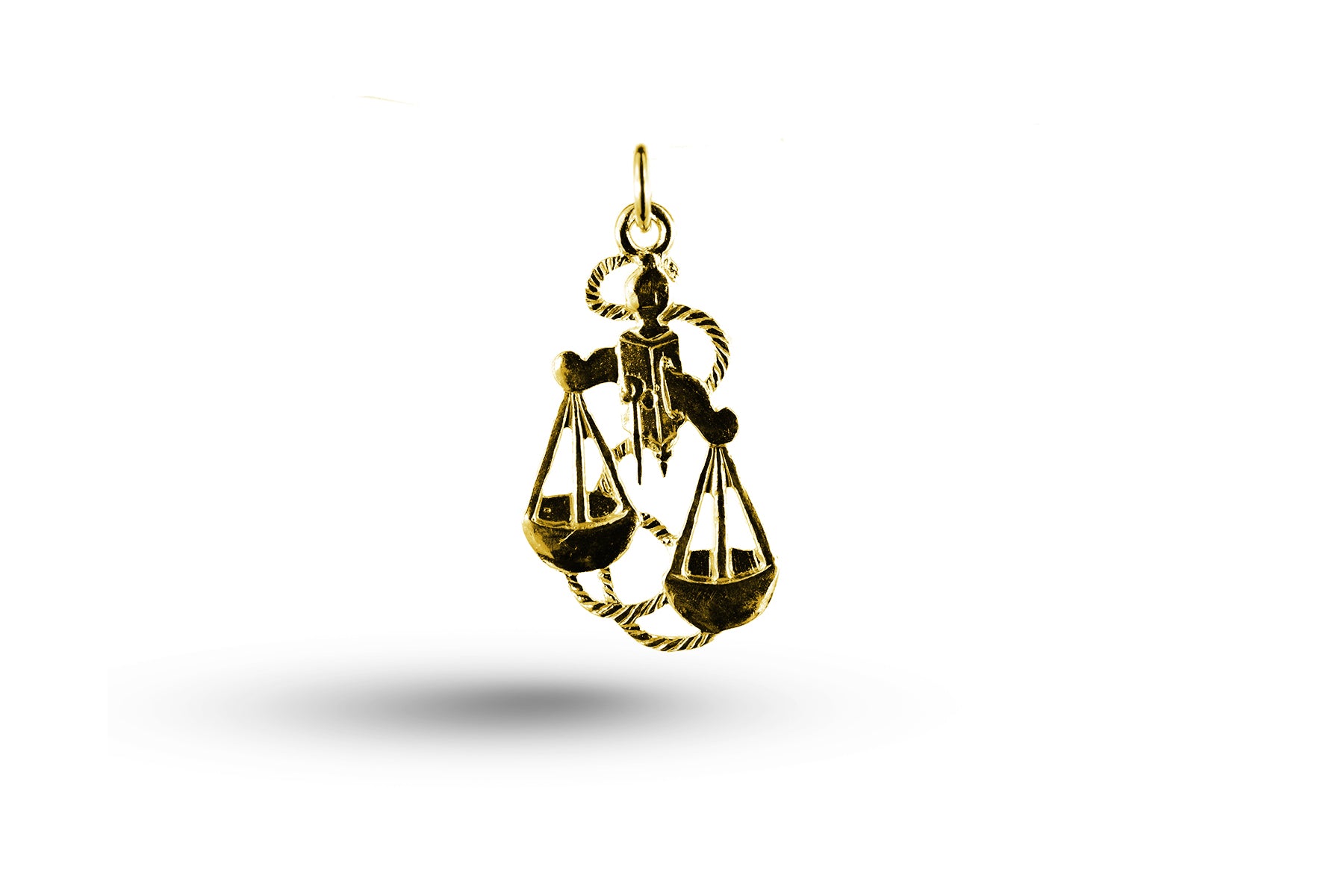 Yellow gold Fancy Libra charm.