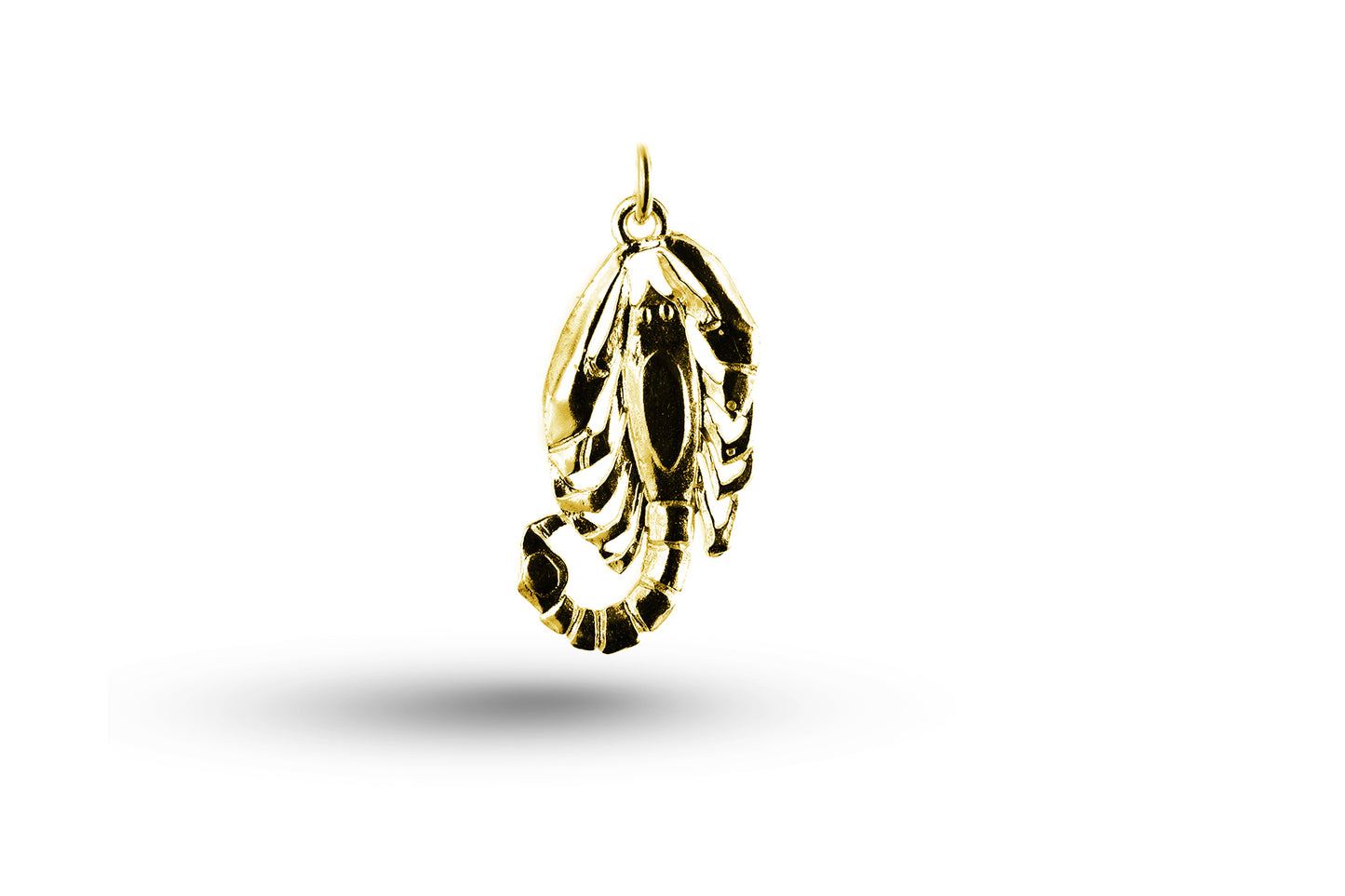 Yellow gold Scorpio charm.