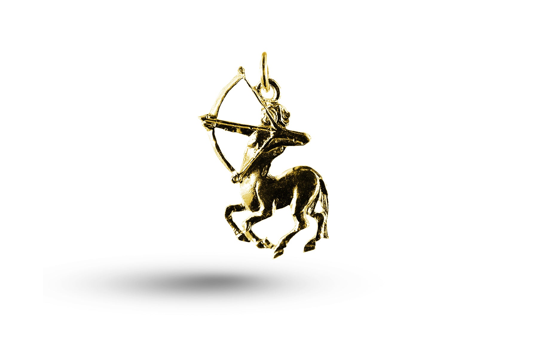 Yellow gold Fancy Sagittarius charm.
