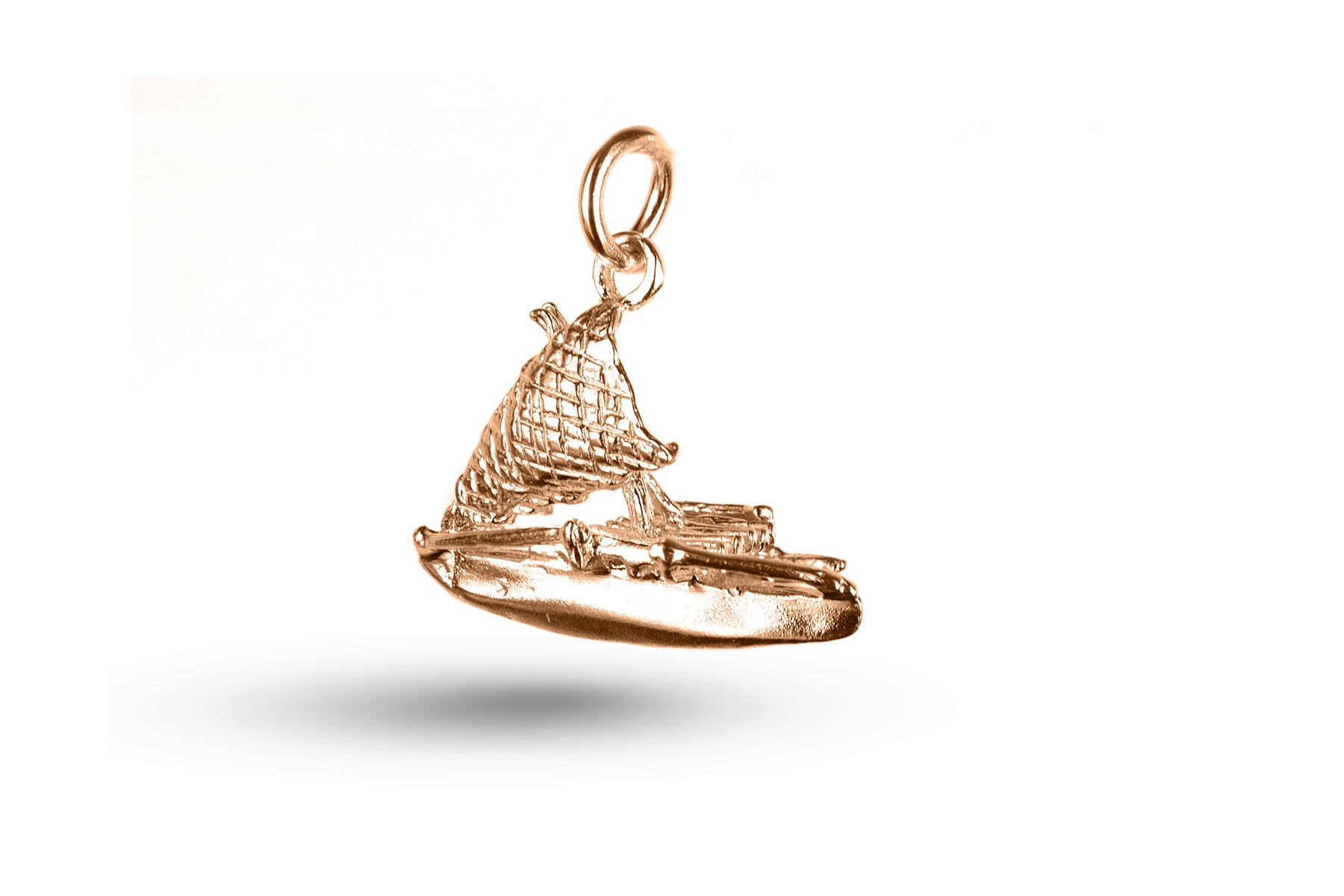 Rose gold Outrigger charm.