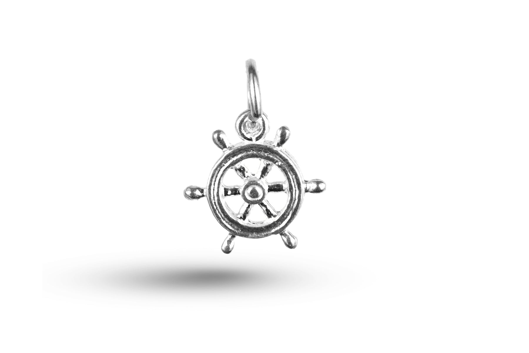 White gold Ships Wheel charm.