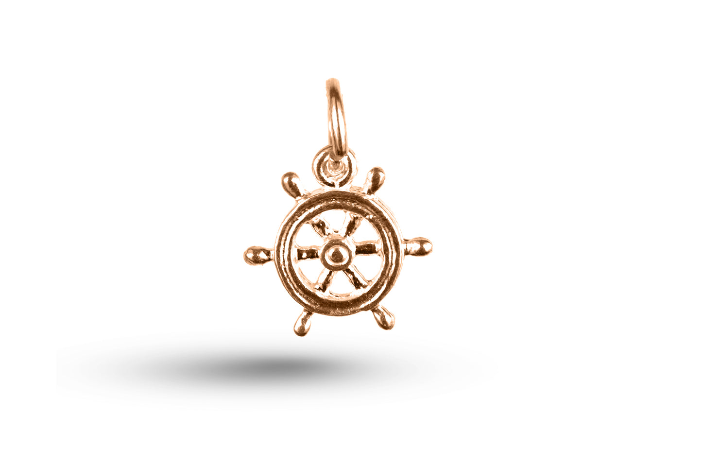 Rose gold Ships Wheel charm.