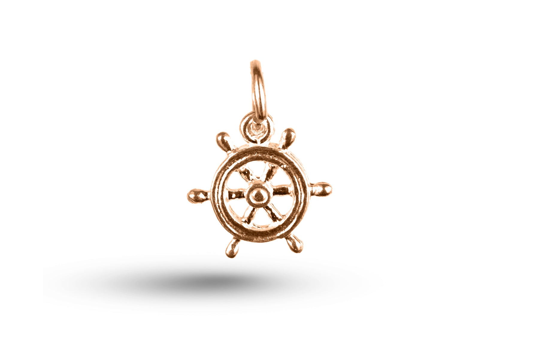 Rose gold Ships Wheel charm.