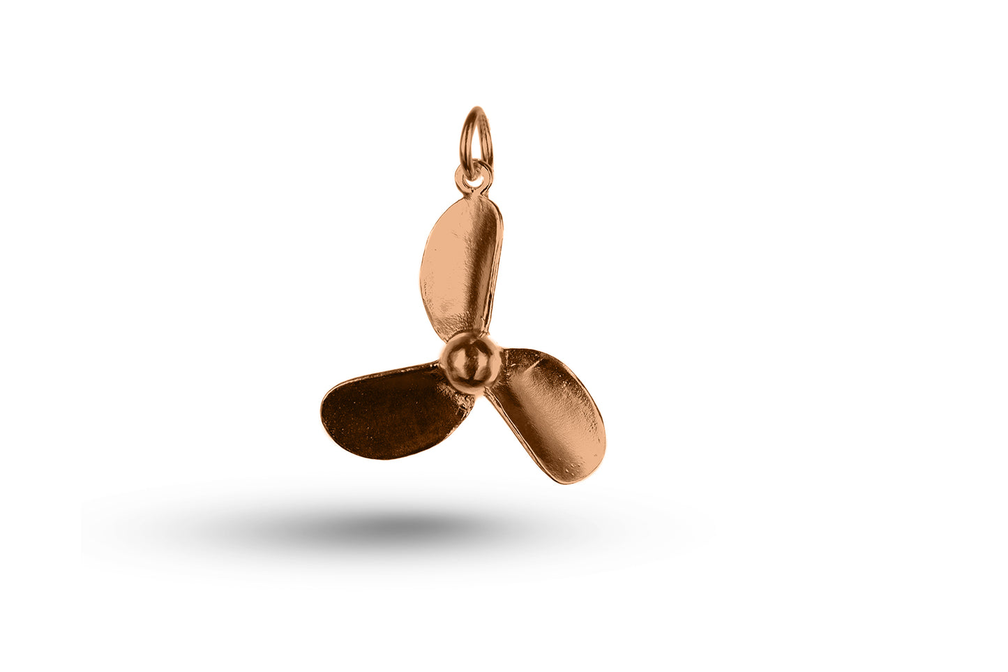 Rose gold Ships Propeller charm.