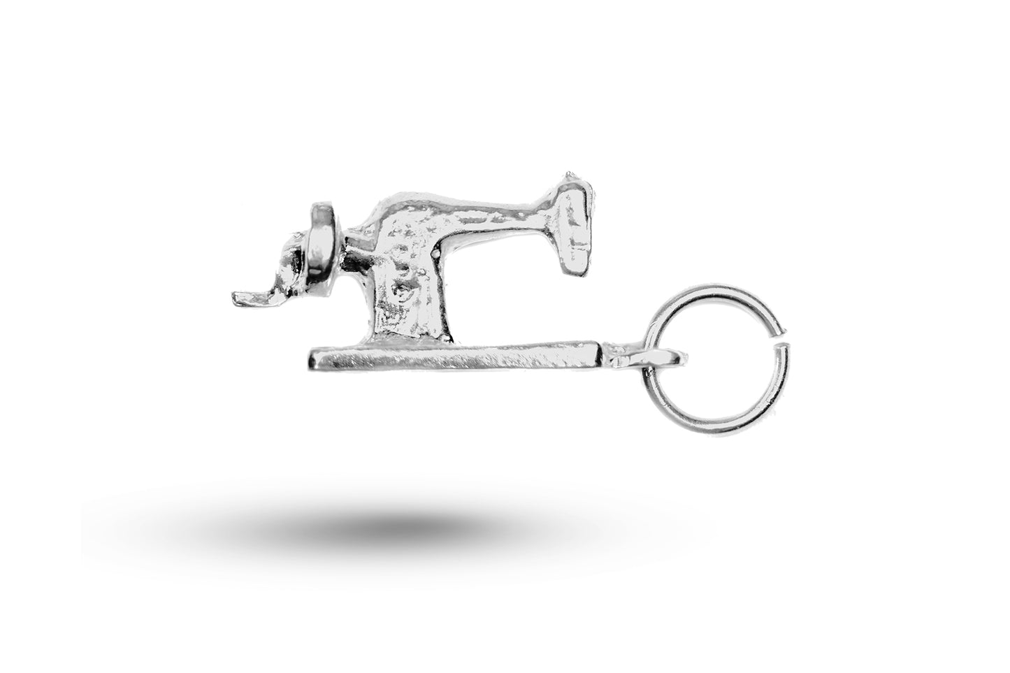 White gold Sewing Machine charm.