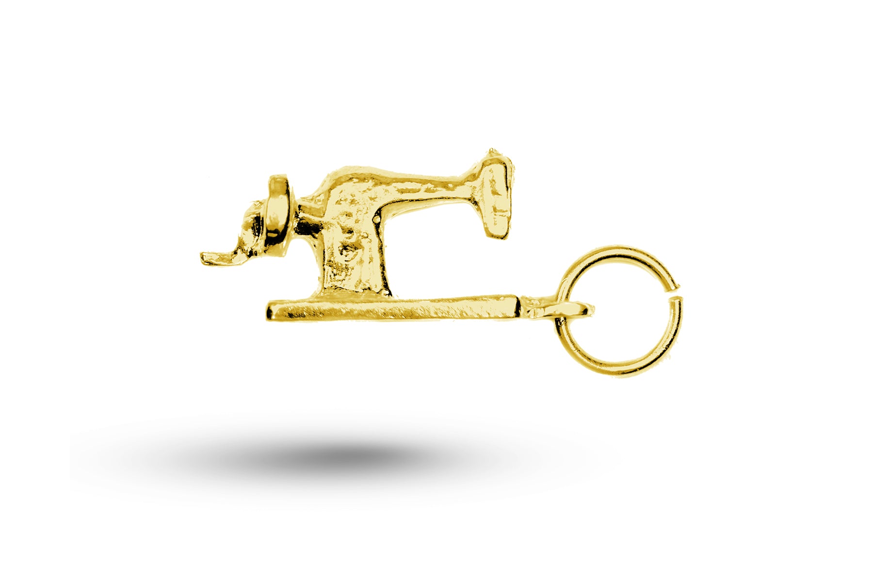Yellow gold Sewing Machine charm.