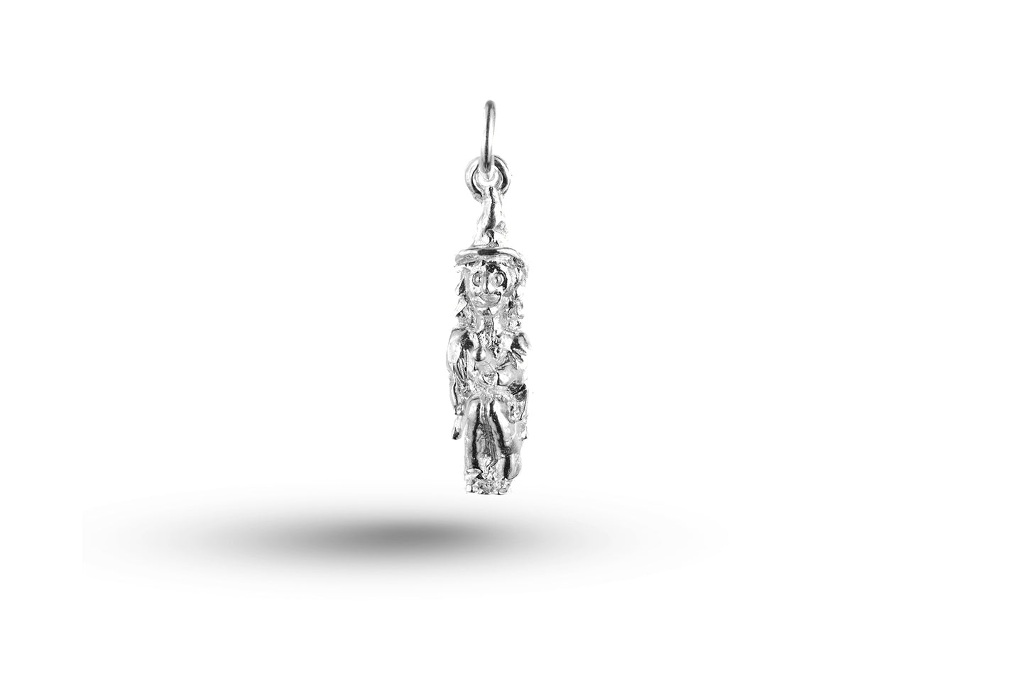 White gold Witch on Broom charm.