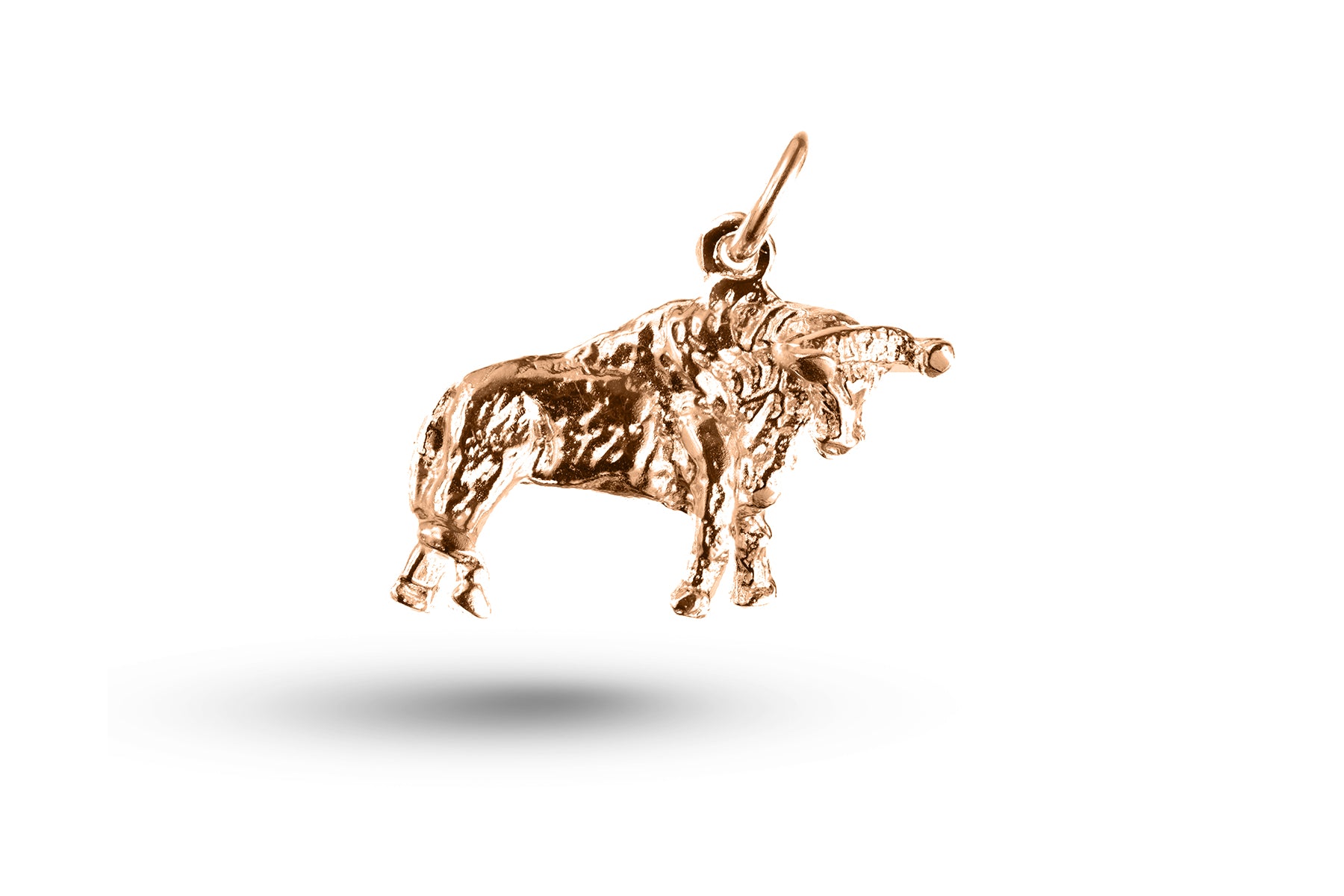 Rose gold El Toro Bull charm.