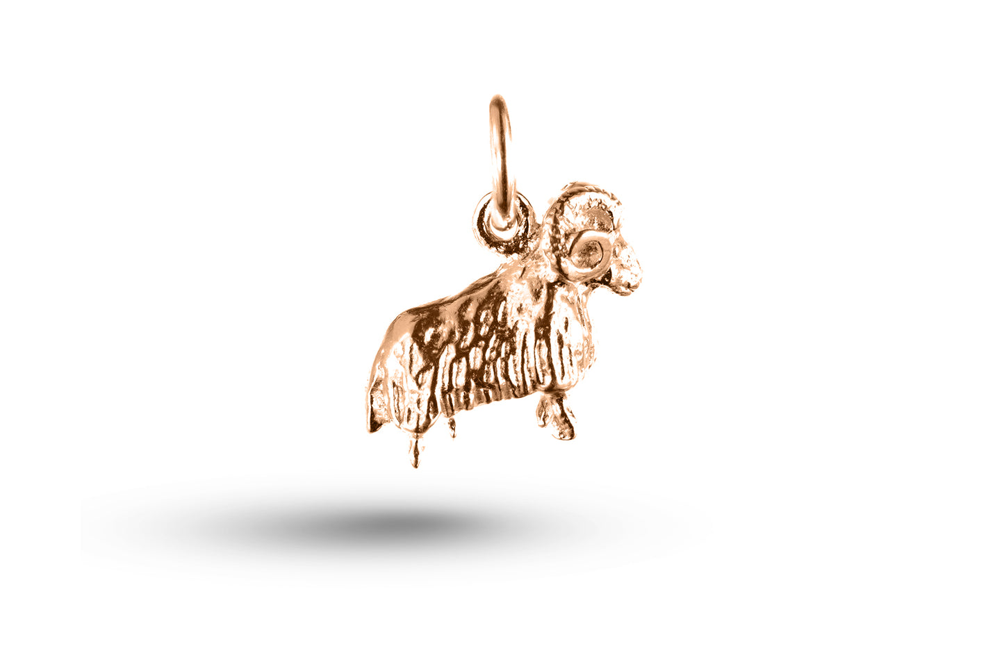 Luxury rose gold Aries ram charm.