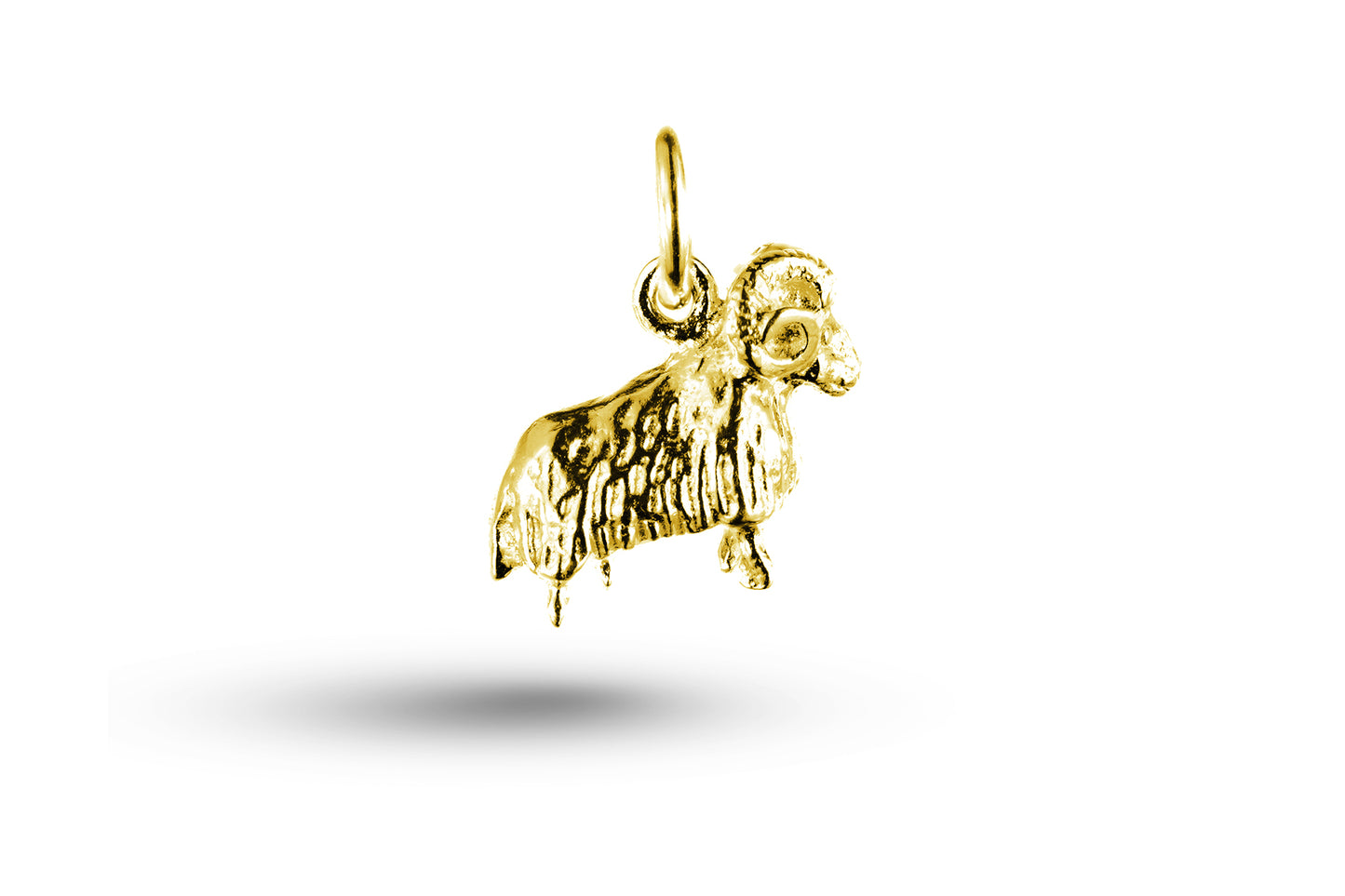 Luxury yellow gold Aries ram charm.