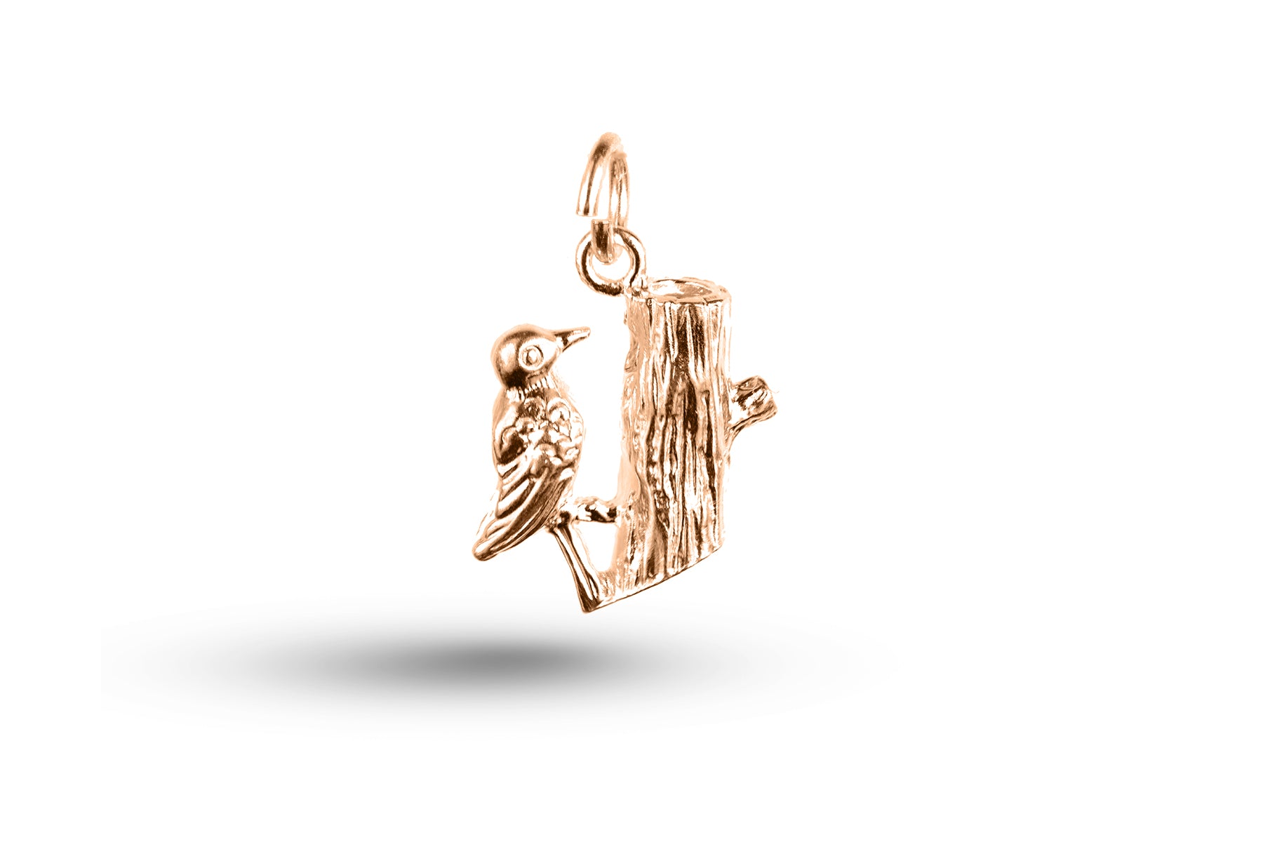 Rose gold Wood Pecker charm.