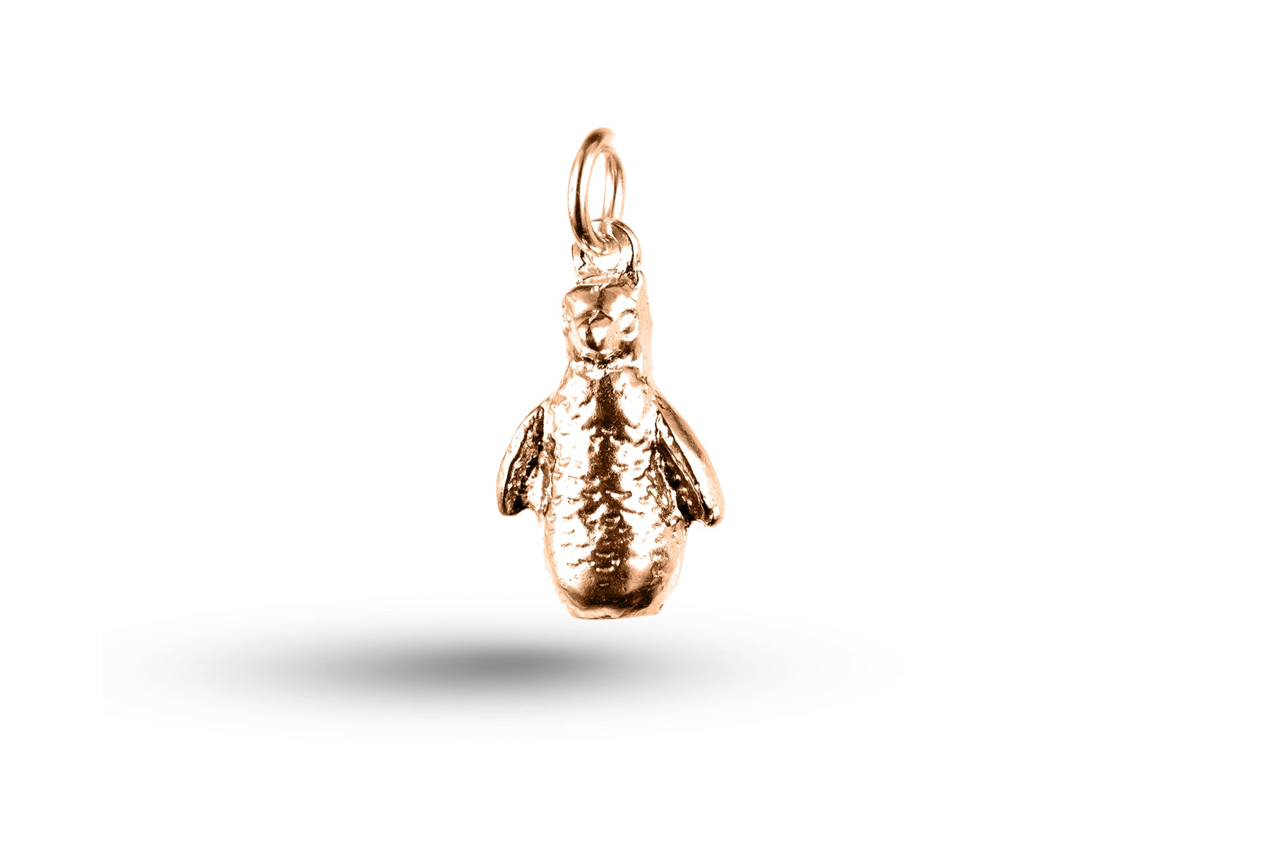 Rose gold Waddling Penguin charm.