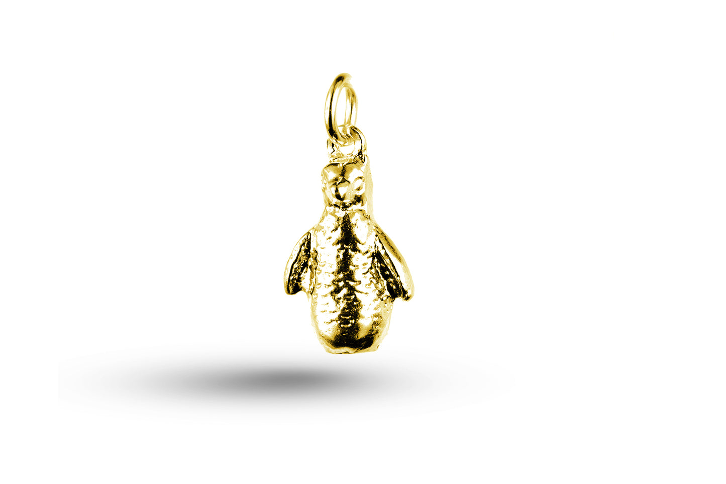 Yellow gold Waddling Penguin charm.