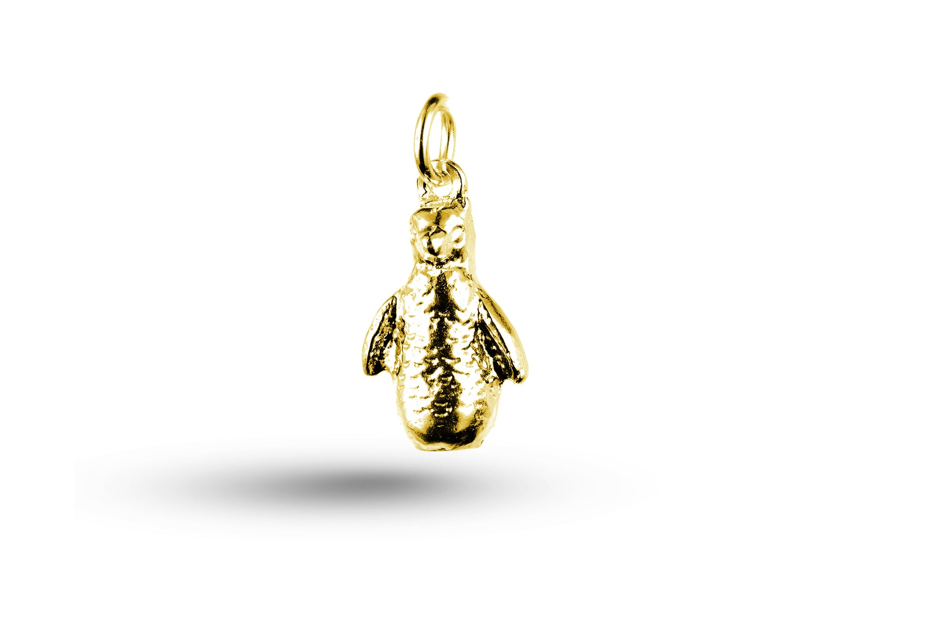 Yellow gold Waddling Penguin charm.