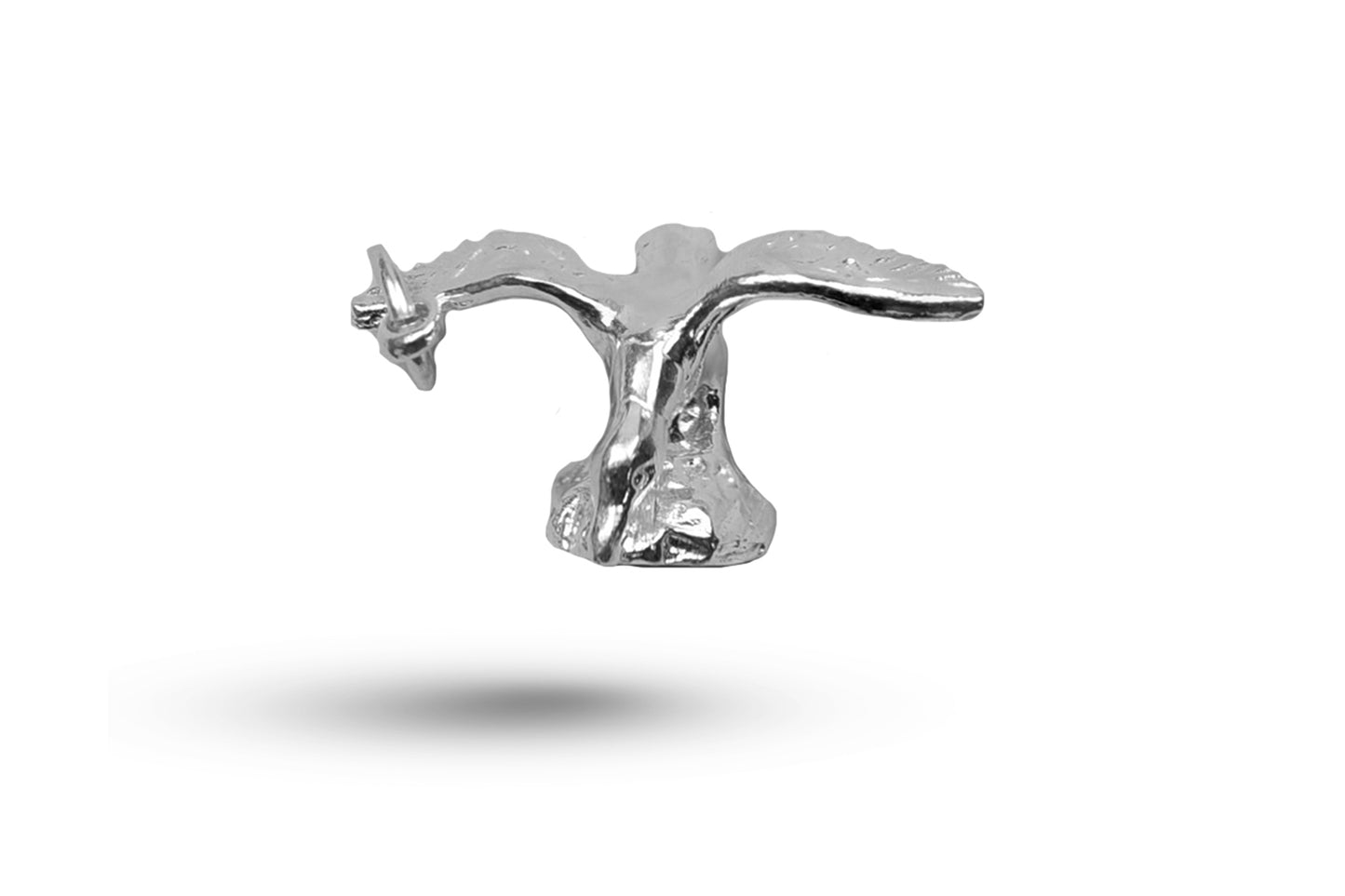 Luxury white gold bird on rock charm.