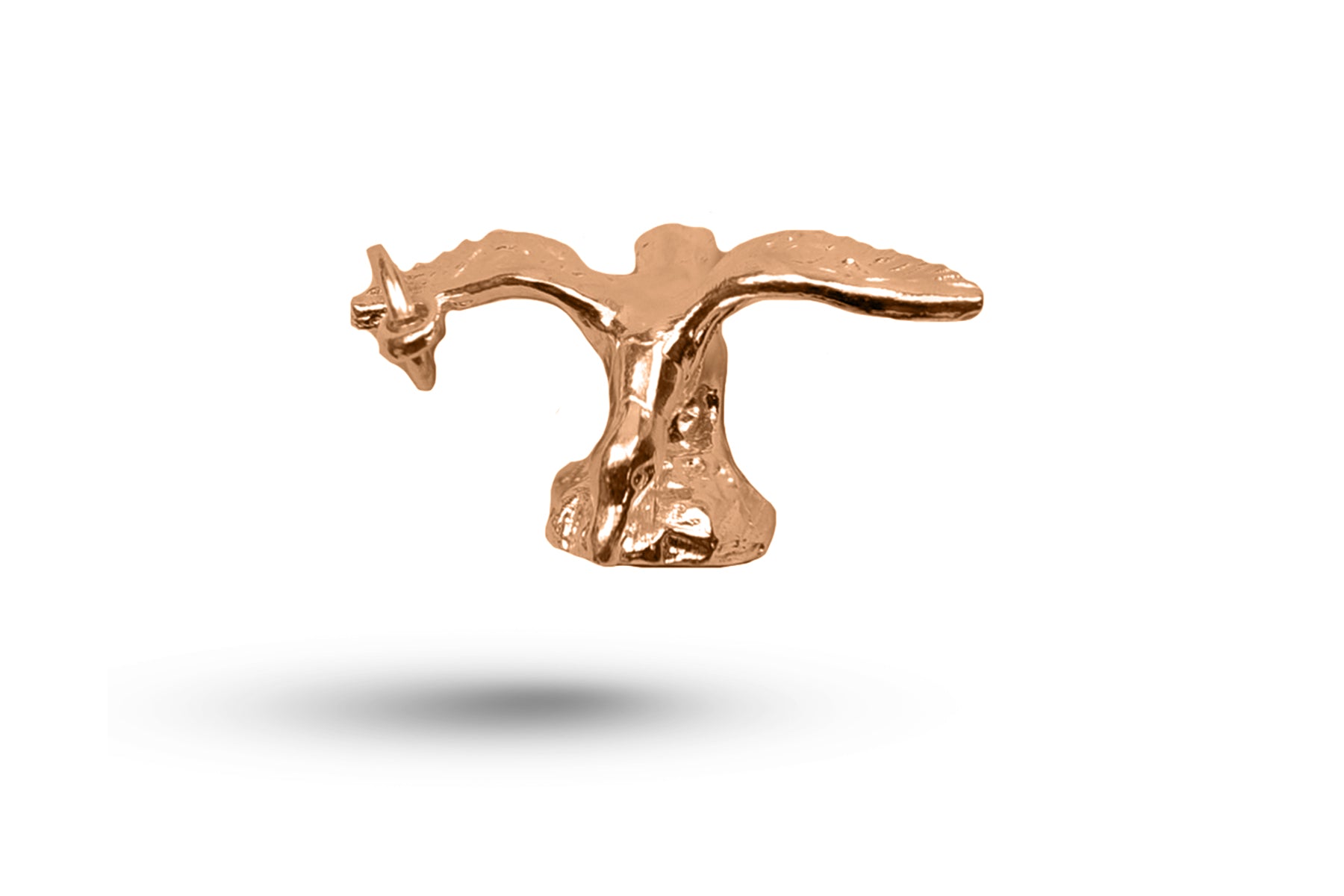 Luxury rose gold bird on rock charm.