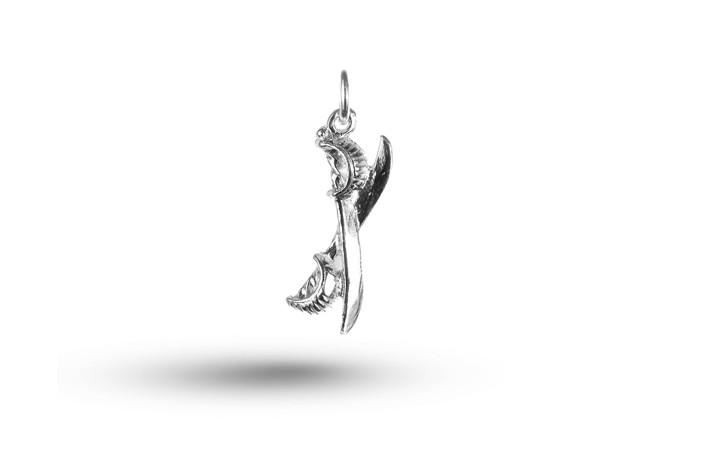 White gold Cutlass charm.