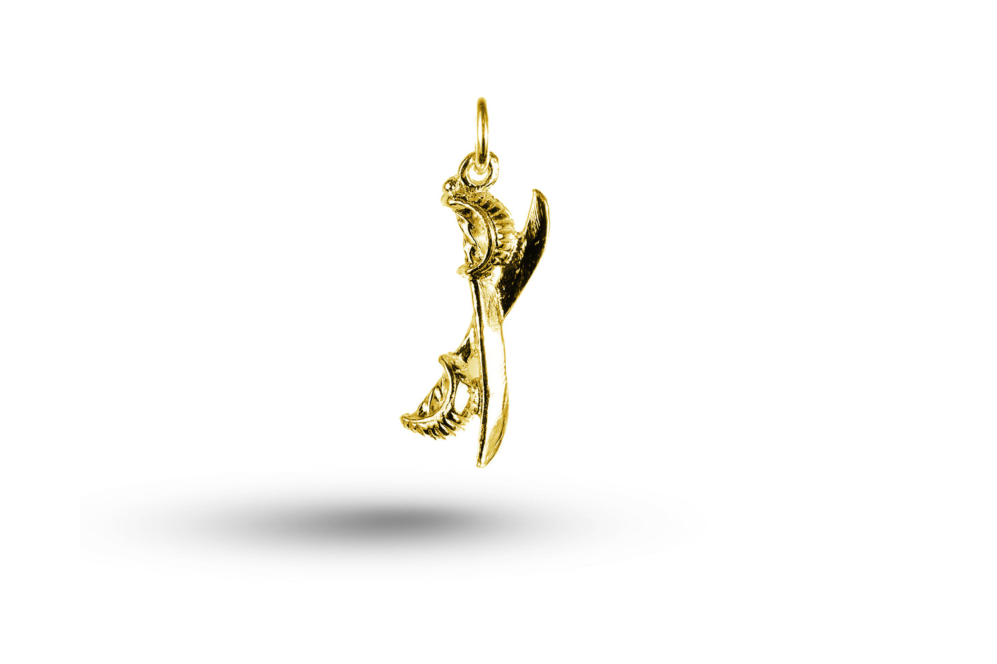 Yellow gold Cutlass charm.