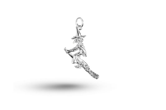 White gold Witch on Broom charm.