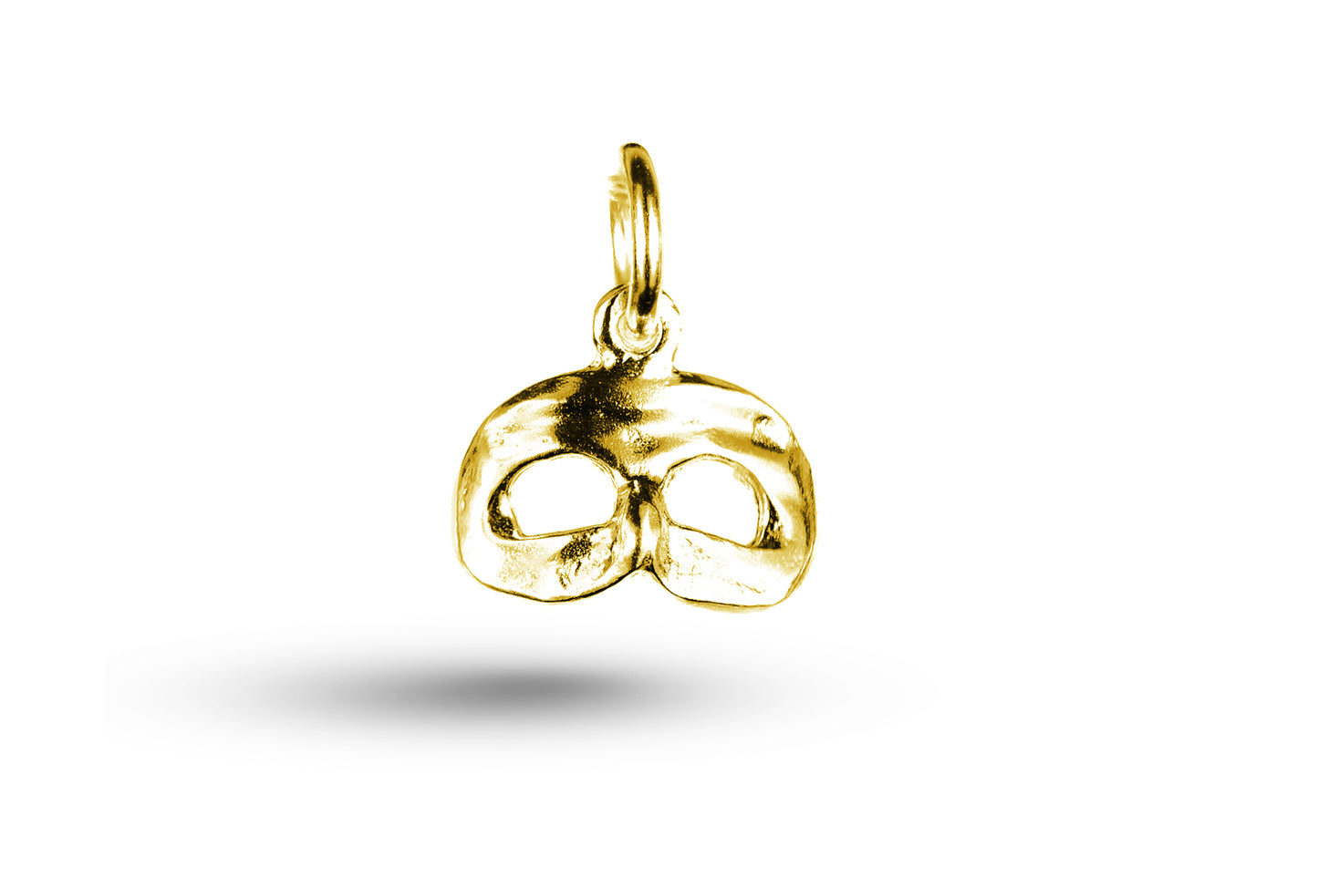 Yellow gold Venice Mask charm.