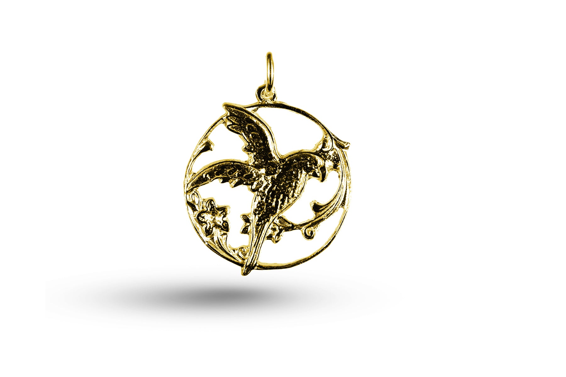 Luxury yellow gold bird in circle charm.