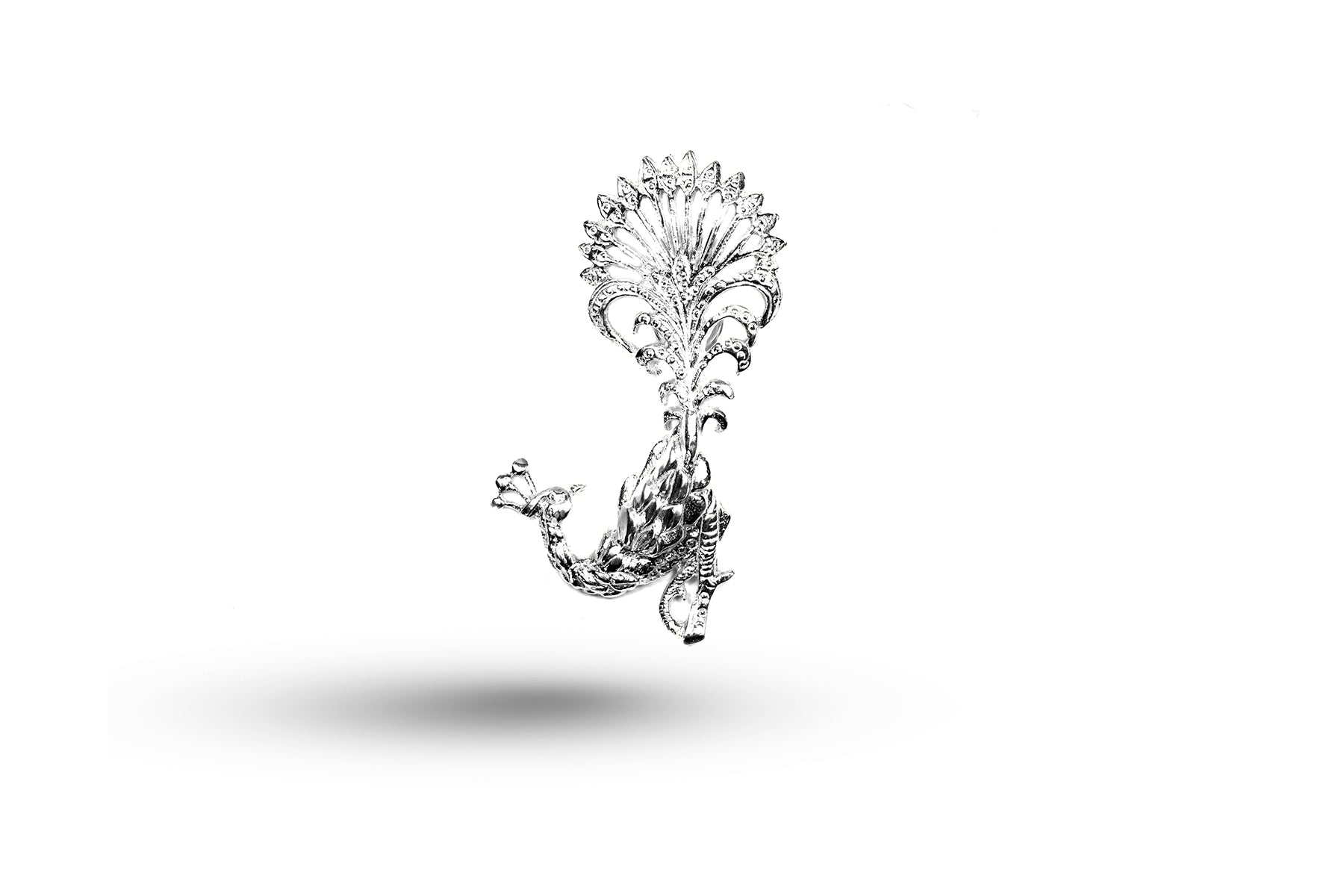 White gold Fancy Peacock charm.