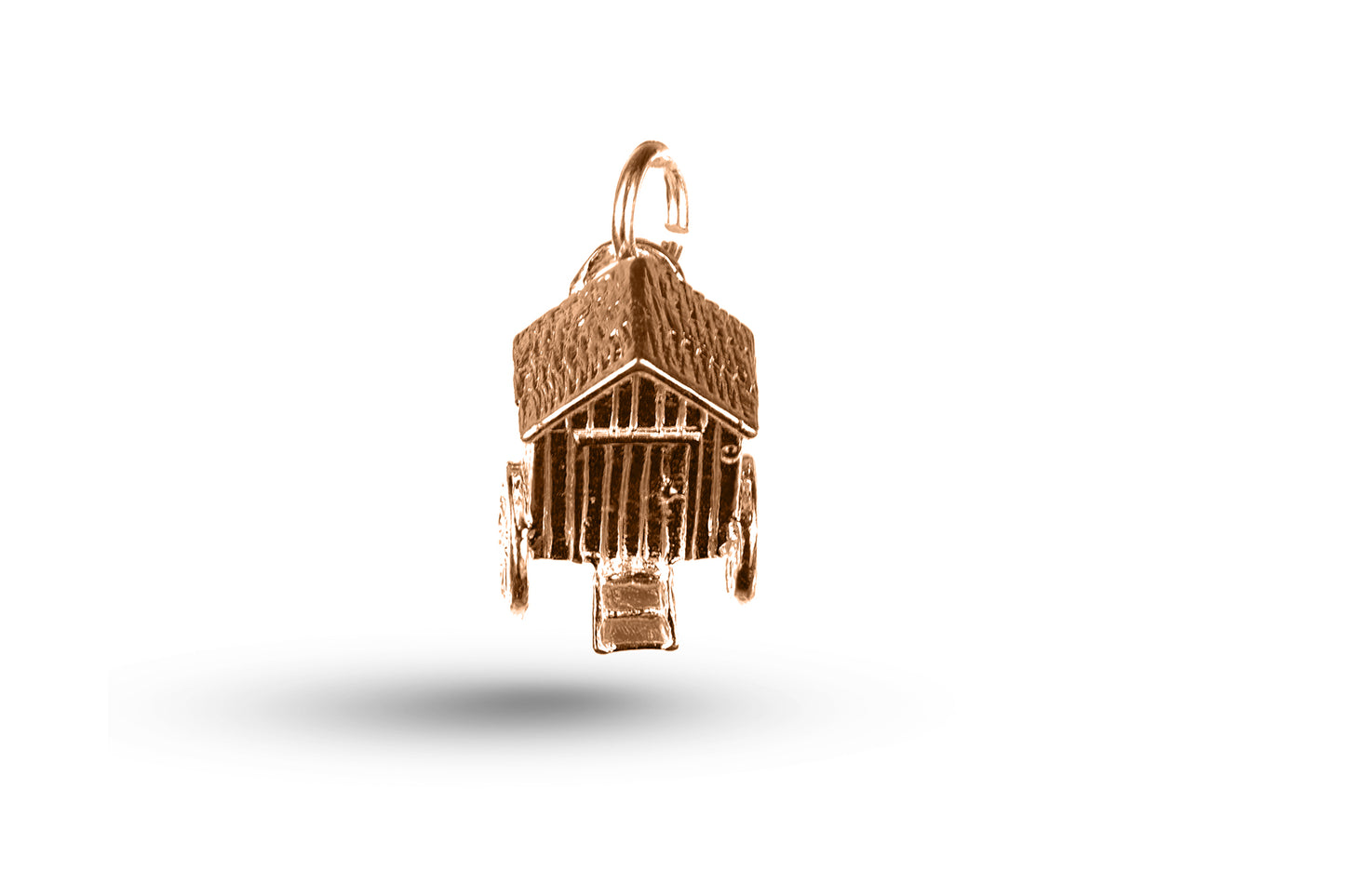 Luxury rose gold bathing hut charm.