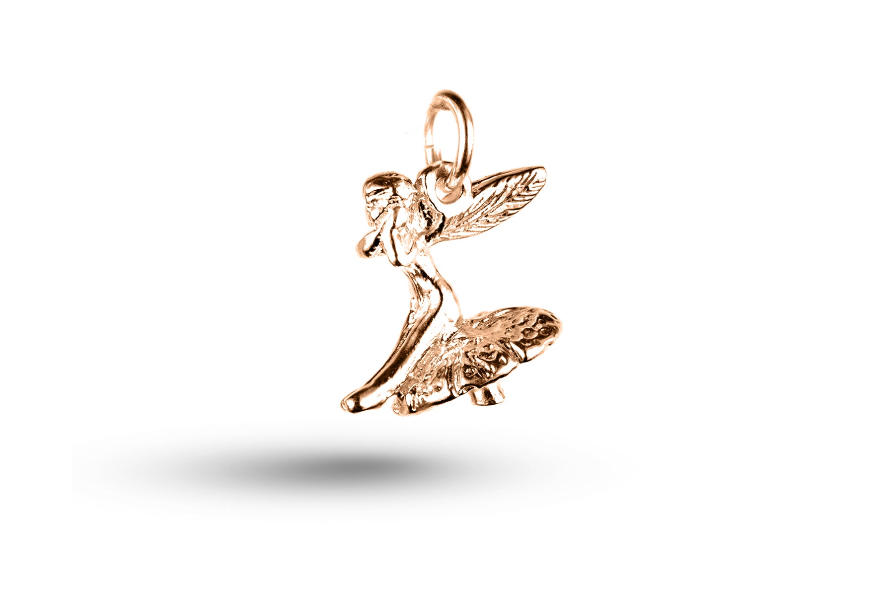 Rose gold Fairy on Mushroom charm.