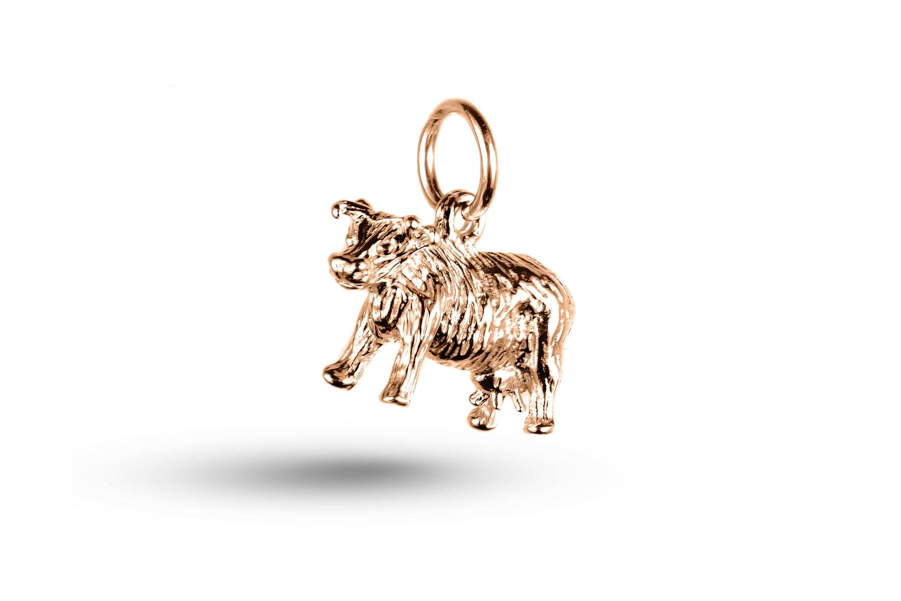 Rose gold Cow charm.