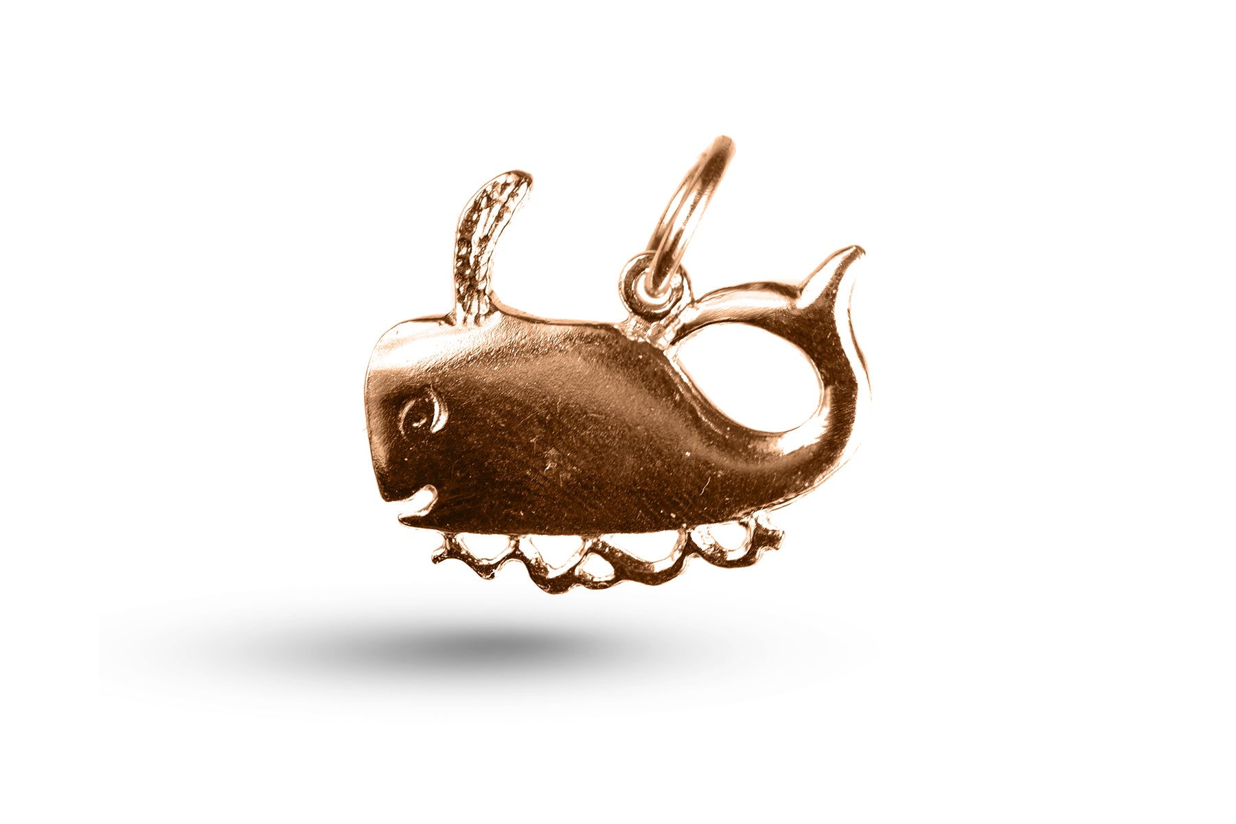 Rose gold Swimming Whale charm.