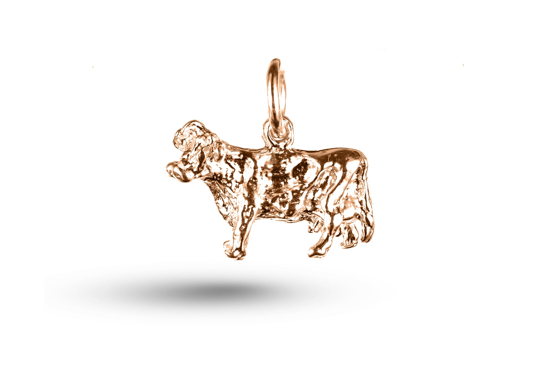 Rose gold Jersey Cow charm.