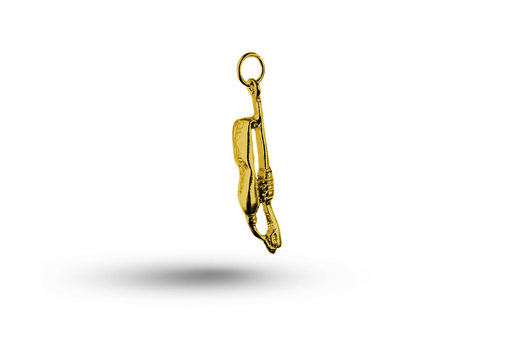 Yellow gold Toothpaste and Brush charm.