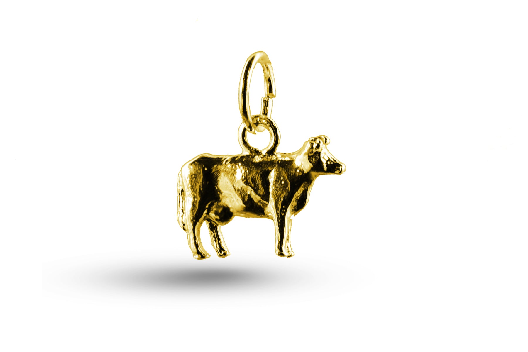 Yellow gold Simple Cow charm.
