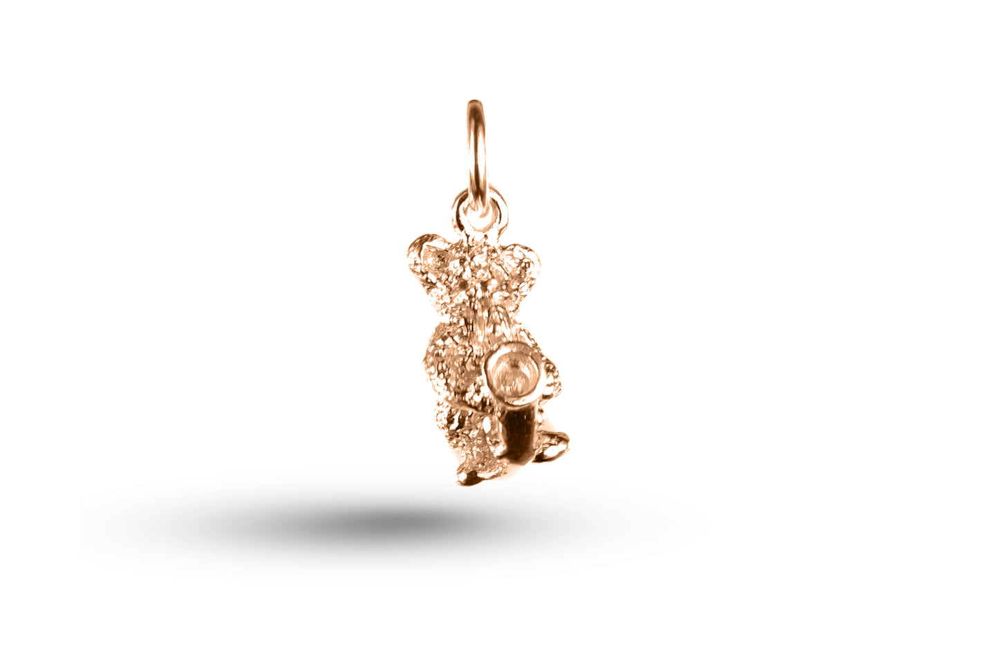Rose gold Ted with Saxophone charm.