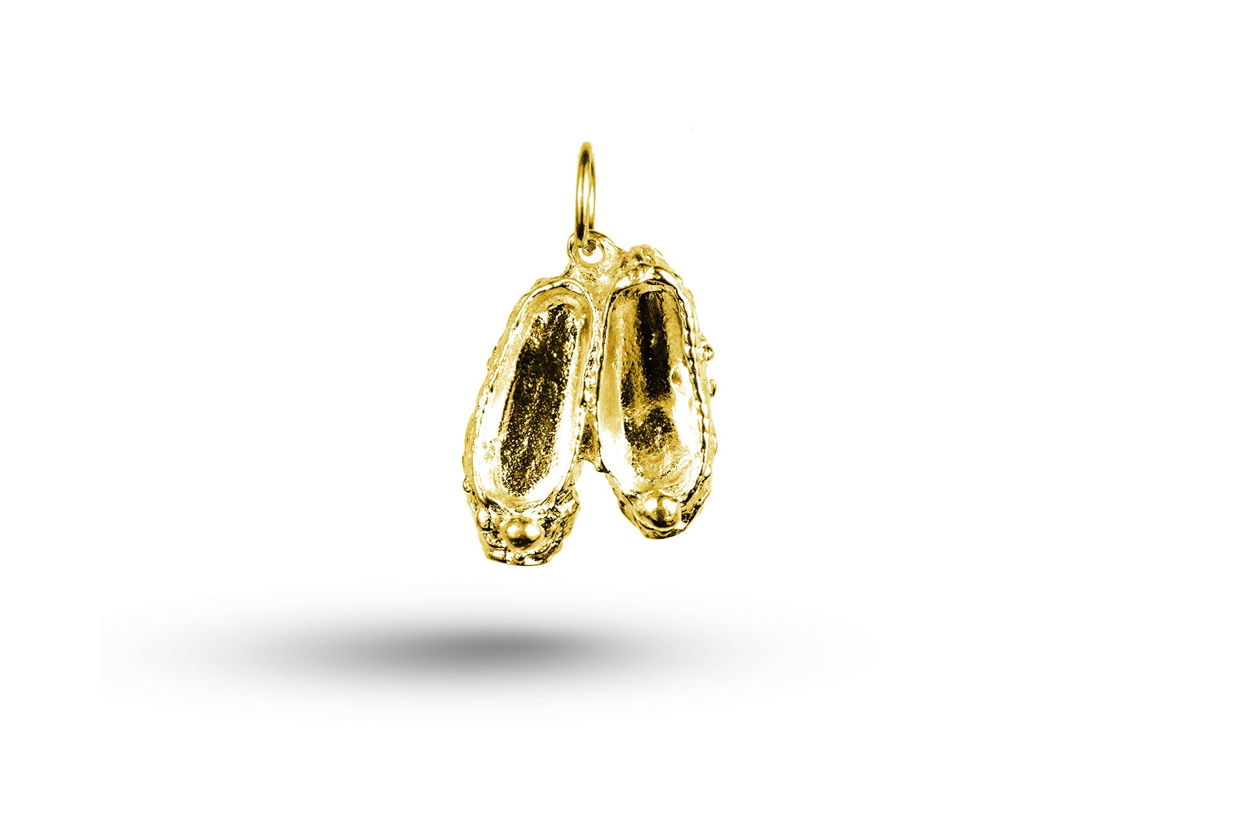 Luxury yellow gold ballet slippers charm.