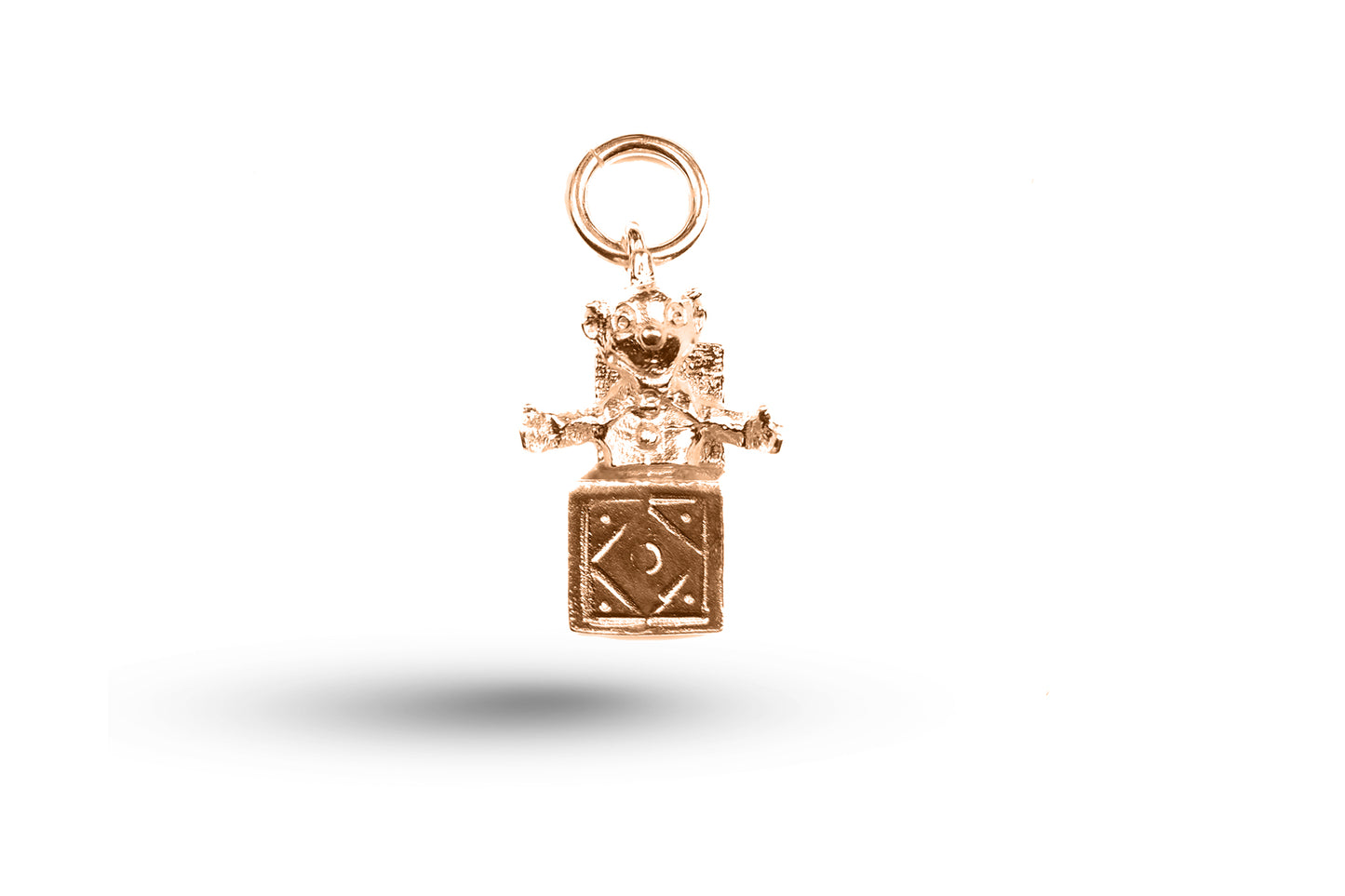 Rose gold Jack in a Box charm.