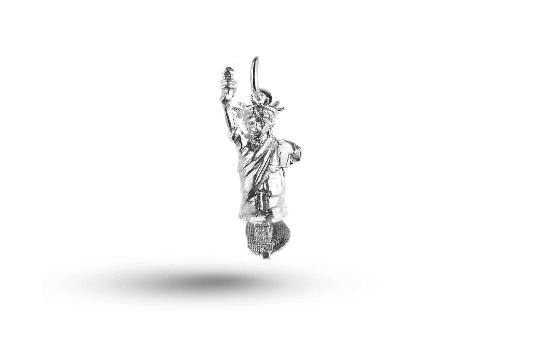 White gold Statue of Liberty charm.