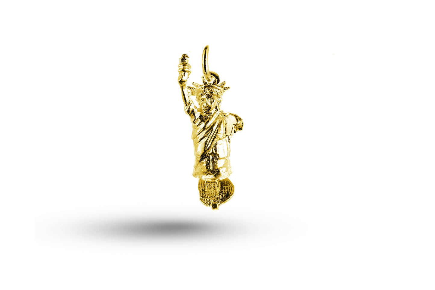 Yellow gold Statue of Liberty charm.