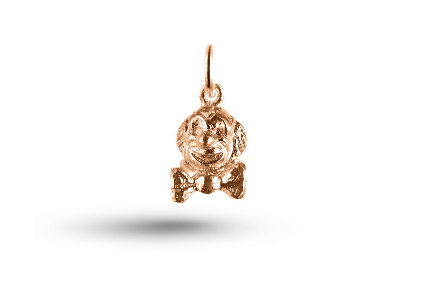 Rose gold Clown Head charm.