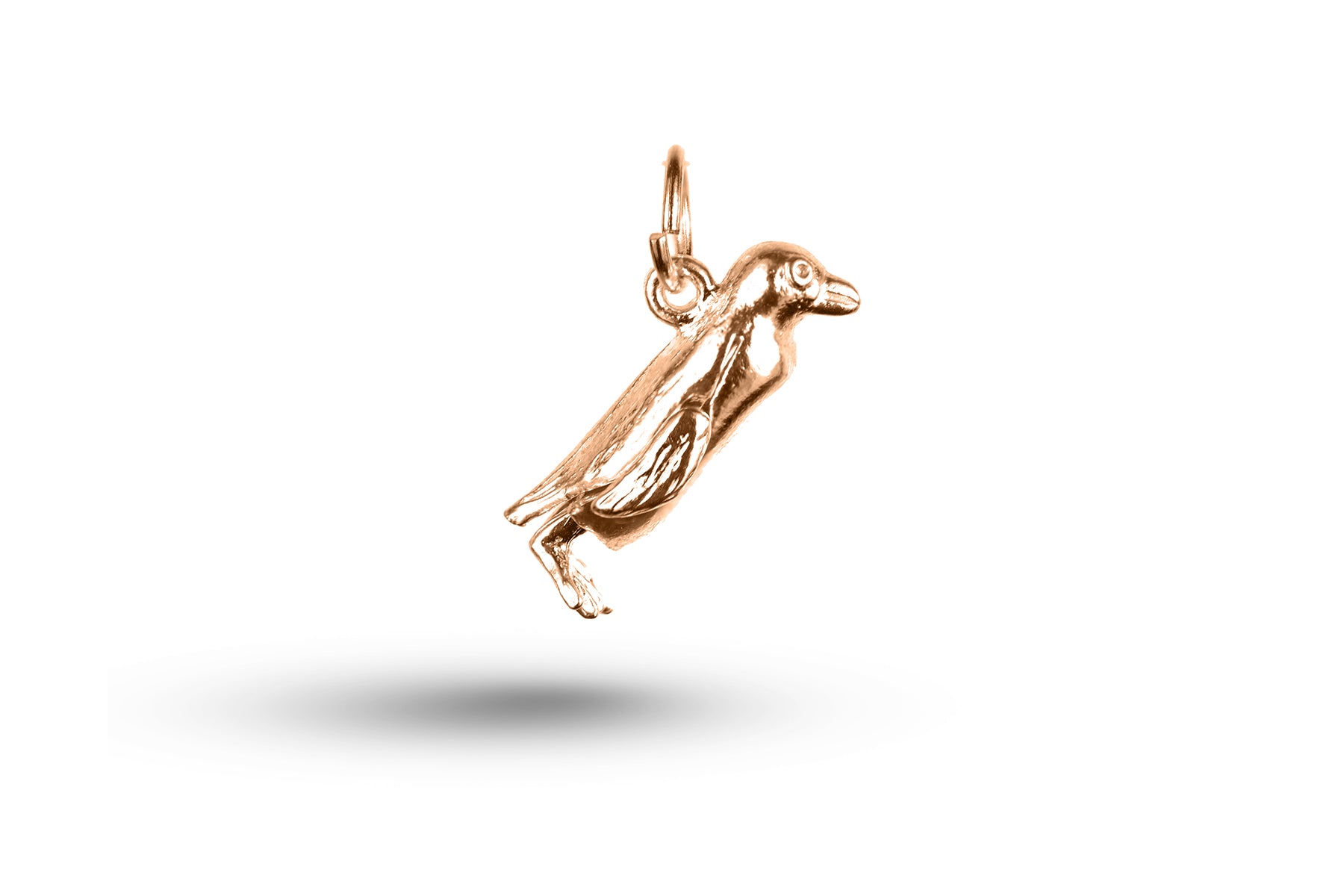 Rose gold Movable Penguin charm.