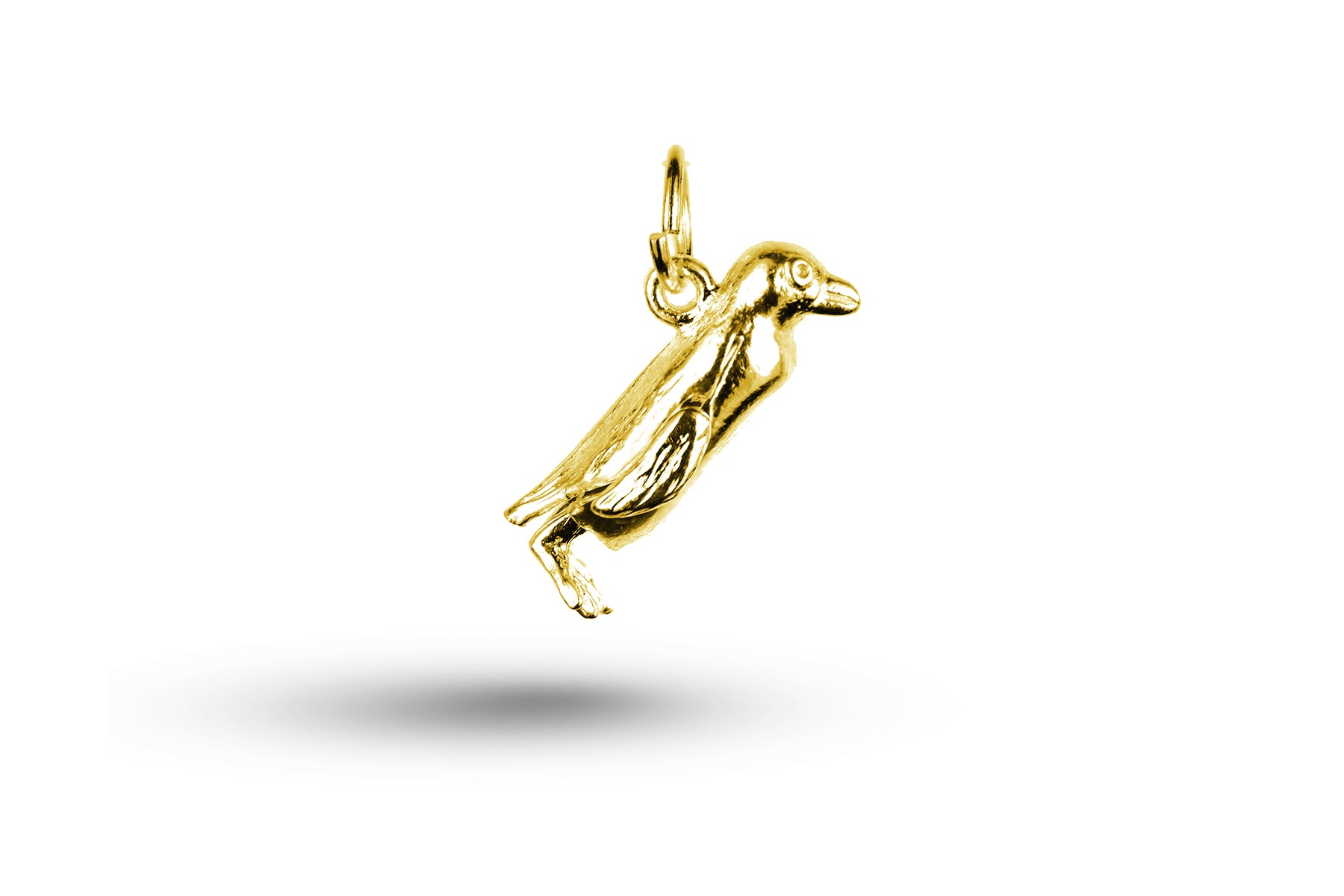 Yellow gold Movable Penguin charm.