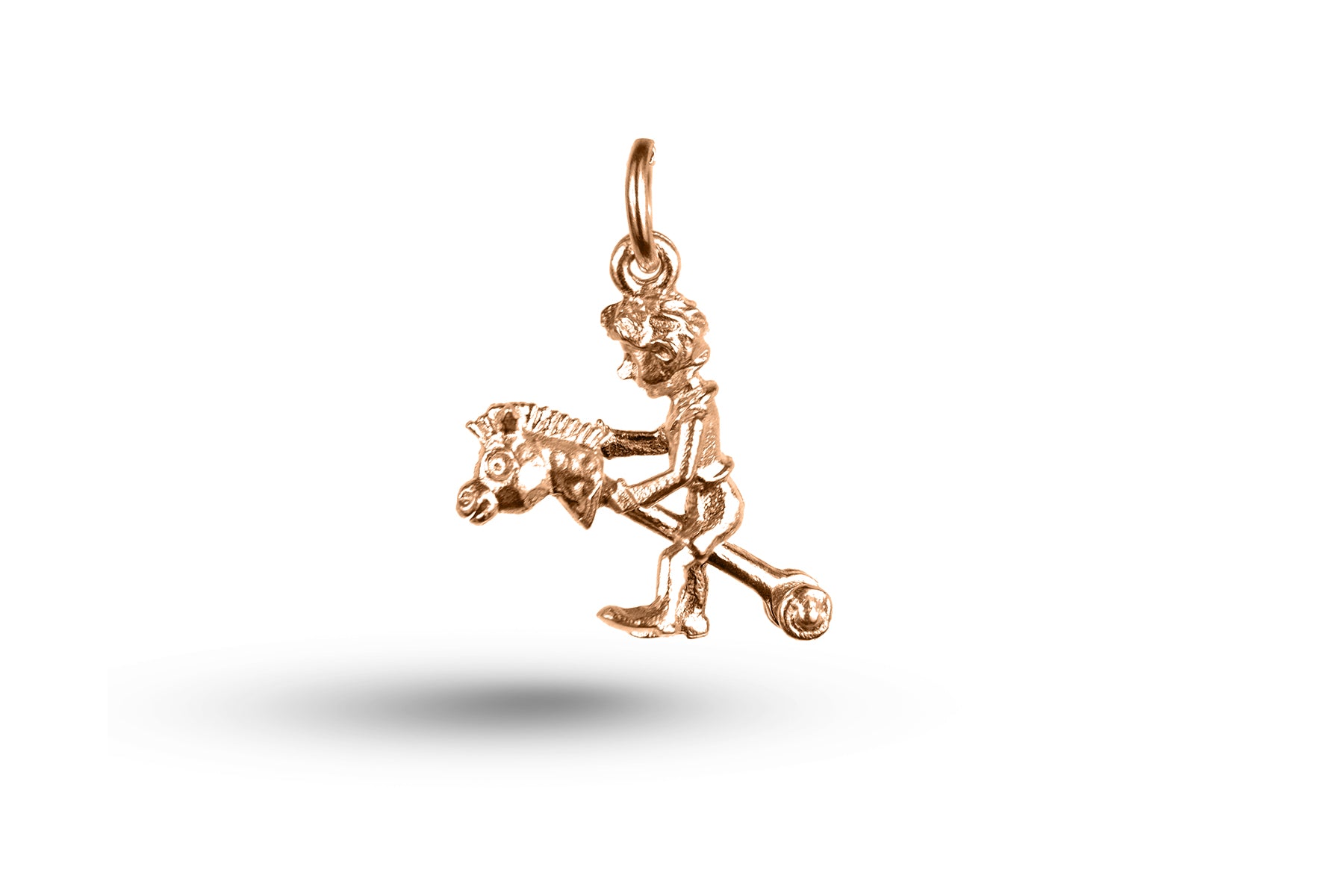 Luxury rose gold Boy on Hobby Horse charm.