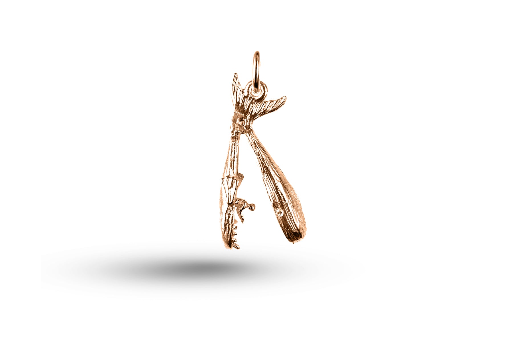 Rose gold open Whale charm.