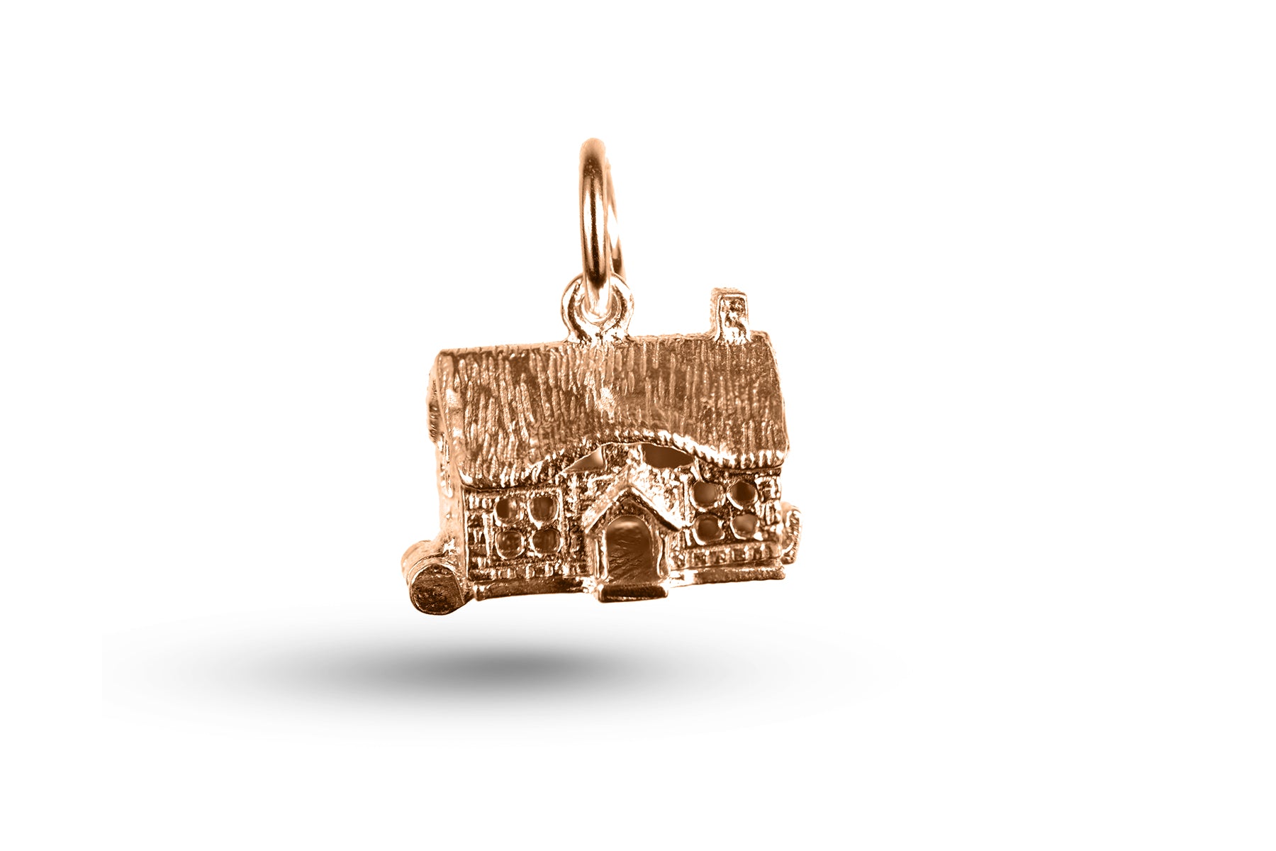 Rose gold Opening Cottage charm.