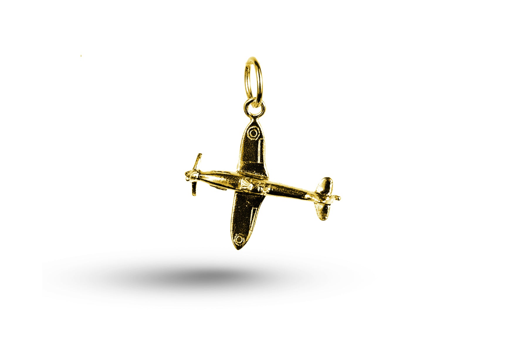 Yellow gold Spitfire charm.