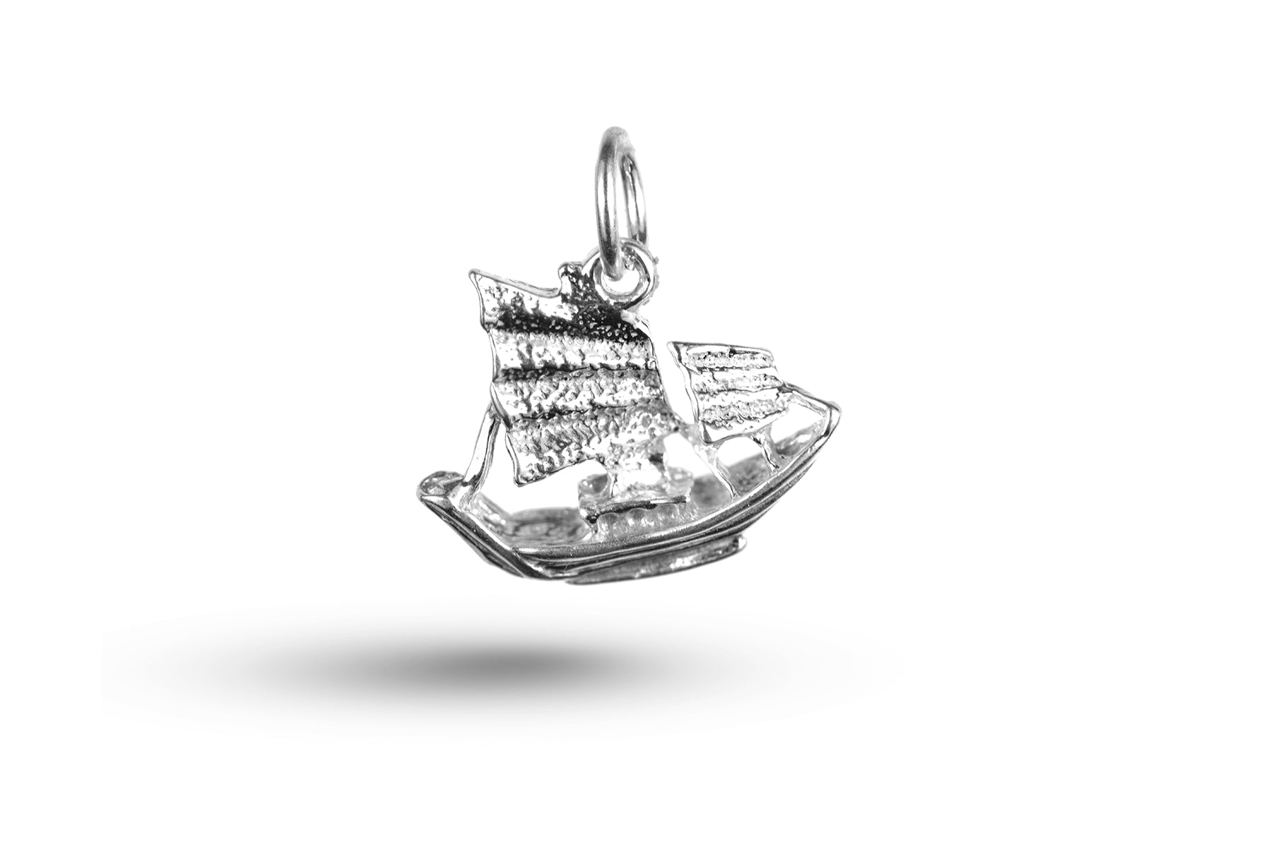 White gold Chinese Junk charm.