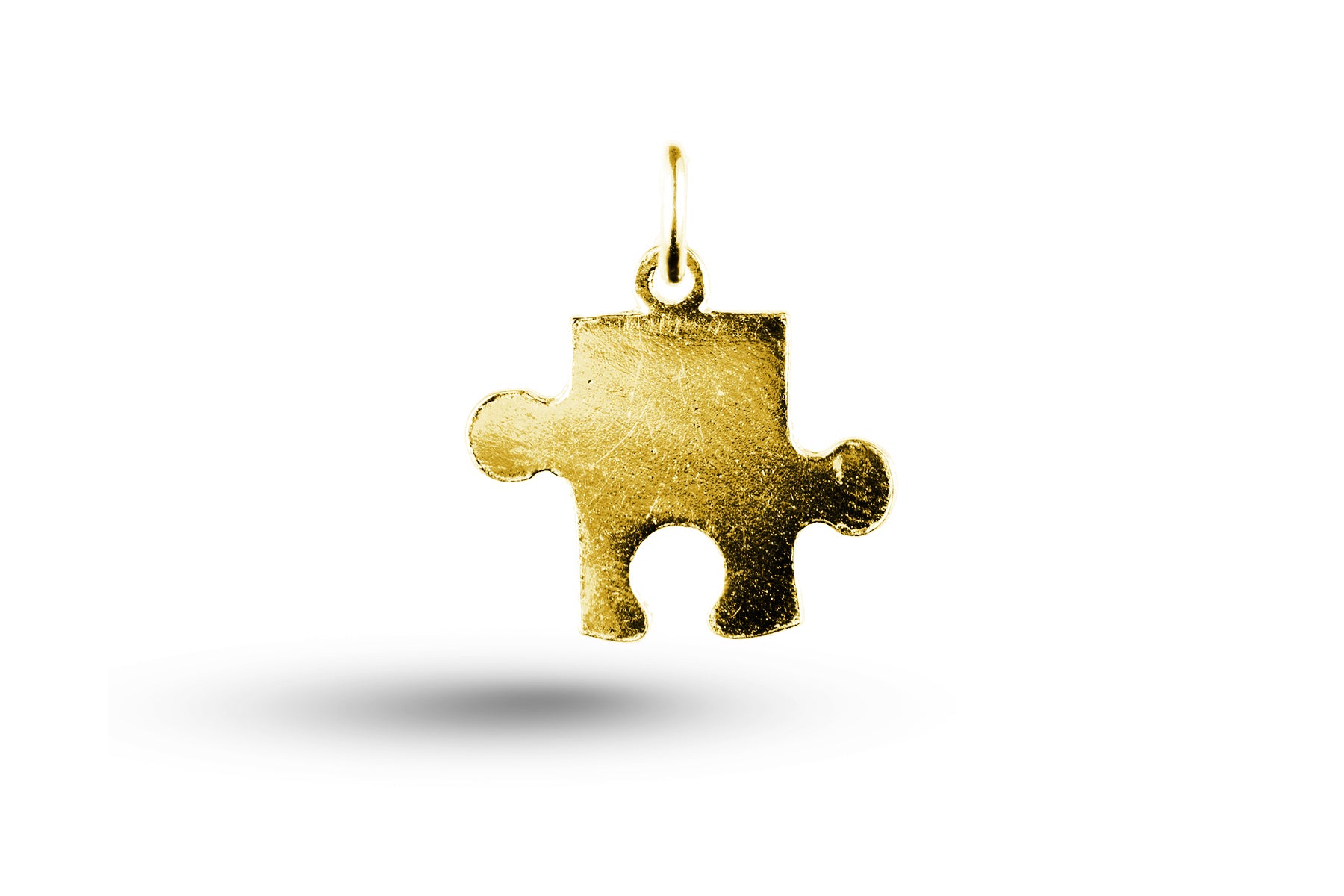 Yellow gold Jigsaw Piece charm.